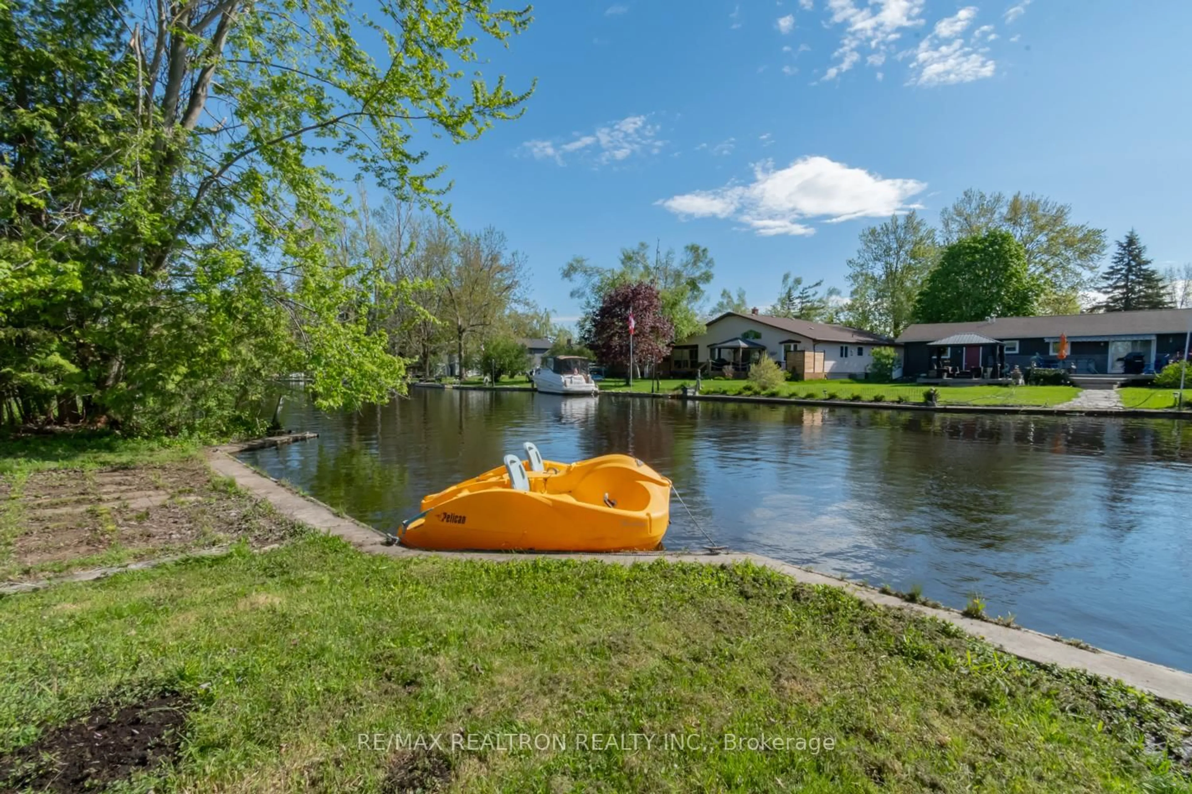 A pic from outside/outdoor area/front of a property/back of a property/a pic from drone, water/lake/river/ocean view for 31 Lake Ave, Ramara Ontario L0K 1B0