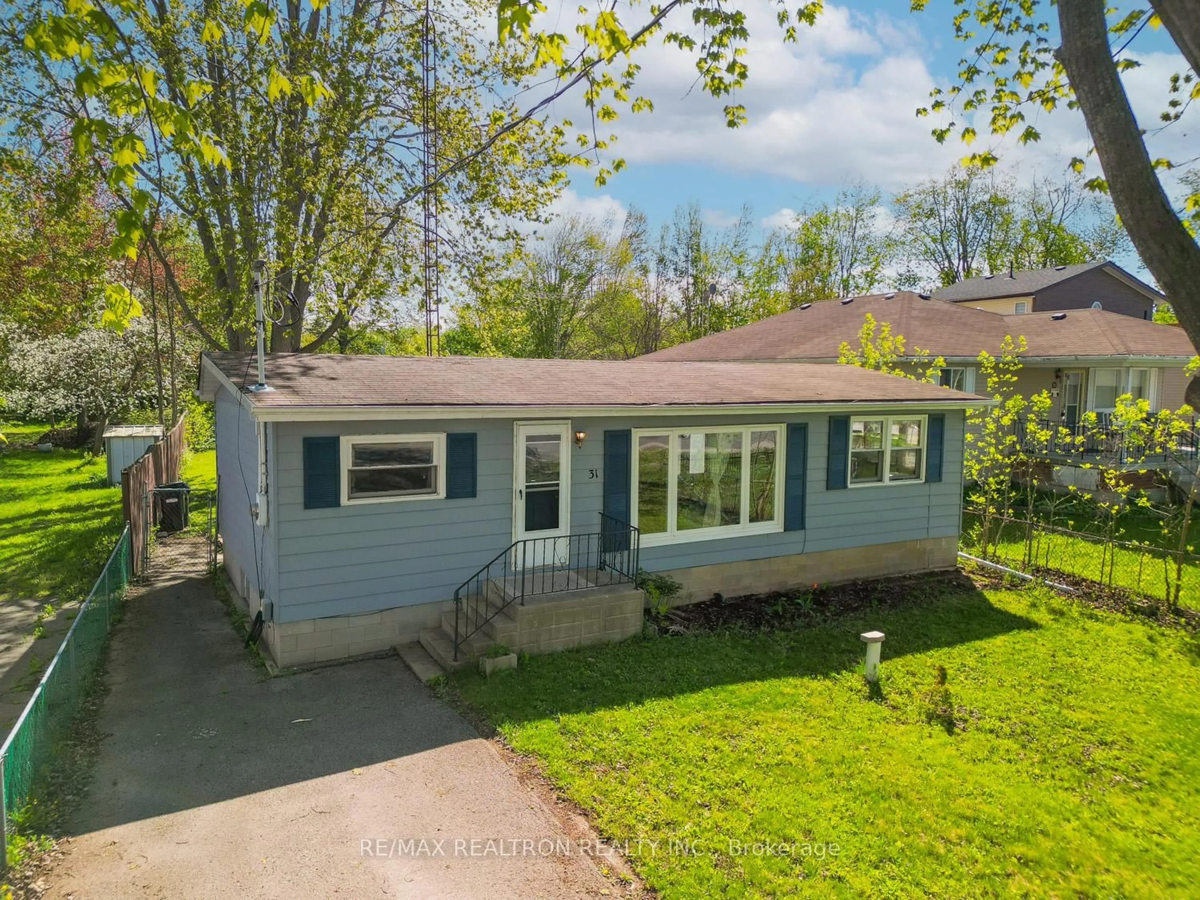 A pic from outside/outdoor area/front of a property/back of a property/a pic from drone, street for 31 Lake Ave, Ramara Ontario L0K 1B0