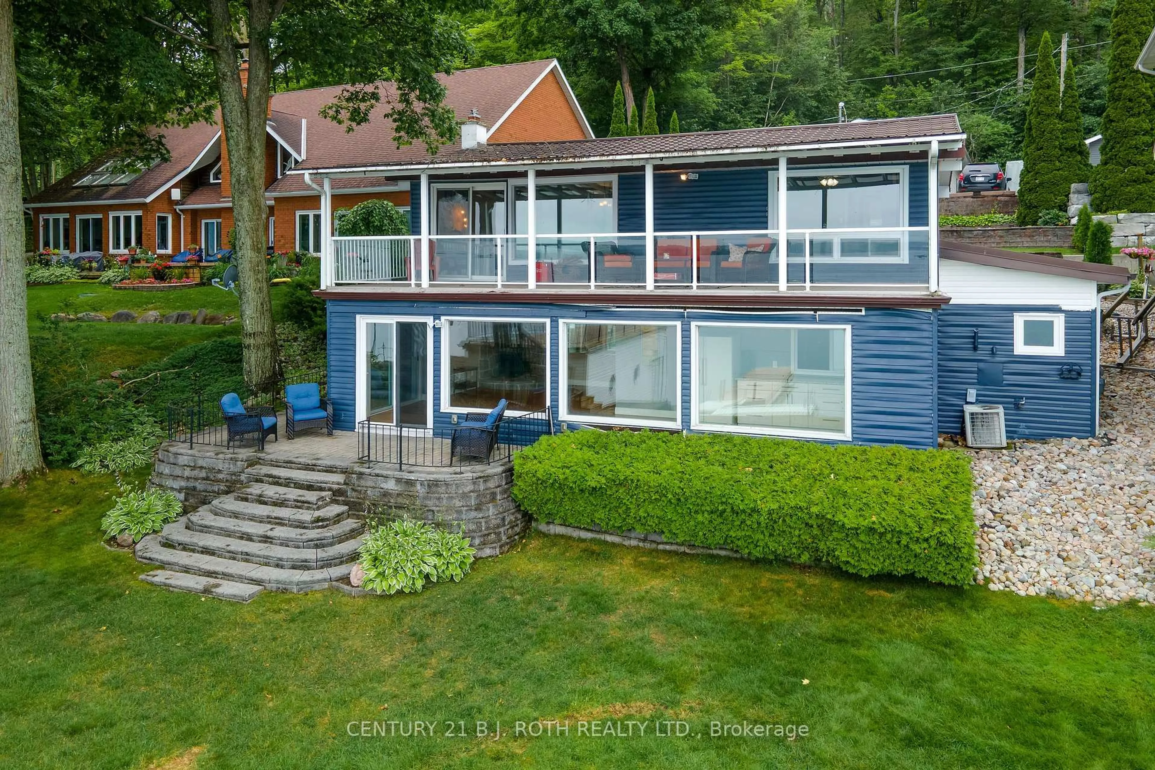 A pic from outside/outdoor area/front of a property/back of a property/a pic from drone, water/lake/river/ocean view for 409 Pheasant Lane, Midland Ontario L4R 5H3