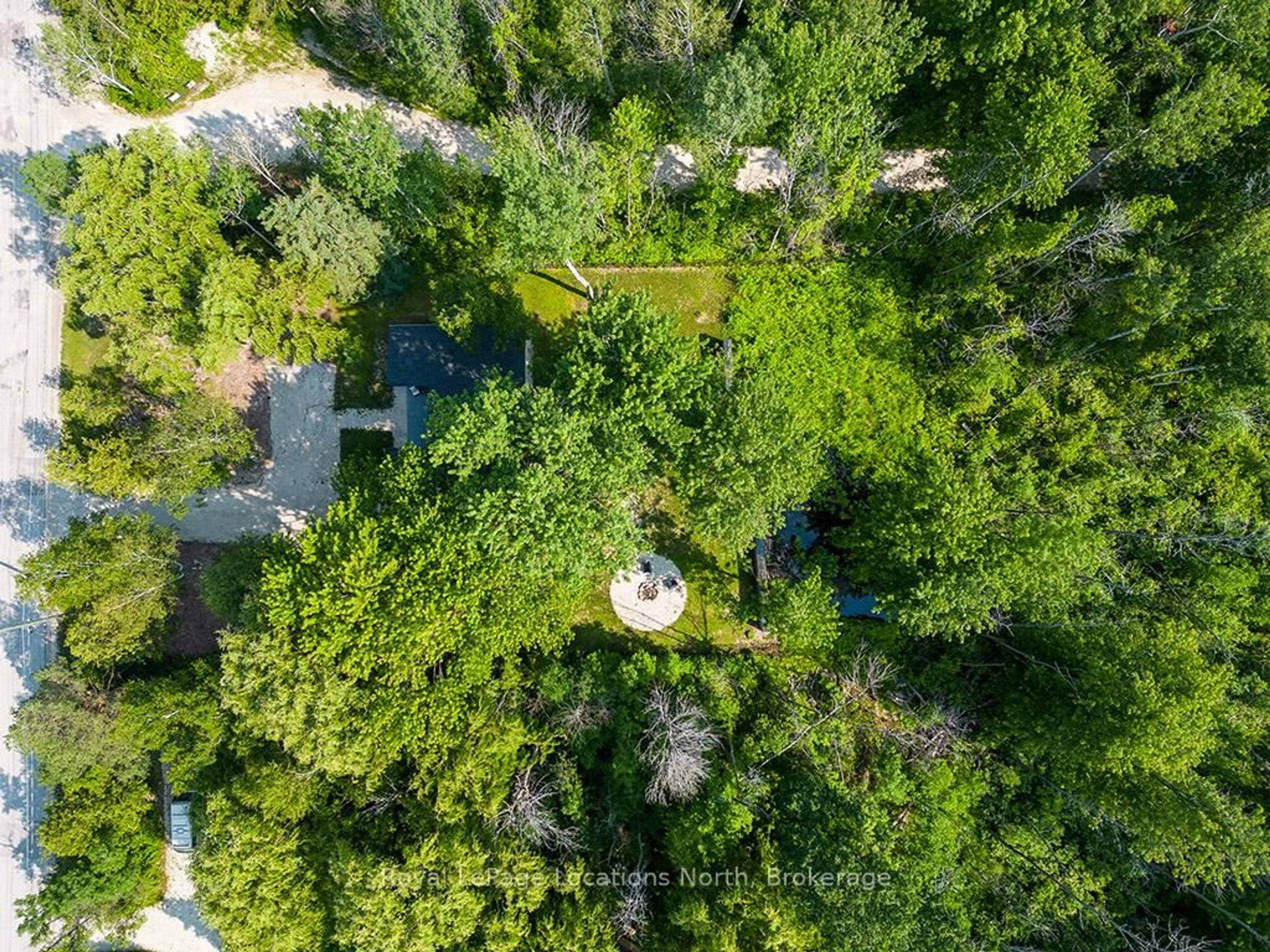 A pic from outside/outdoor area/front of a property/back of a property/a pic from drone, forest/trees view for 135 Longpoint Rd, Collingwood Ontario L9Y 0T9