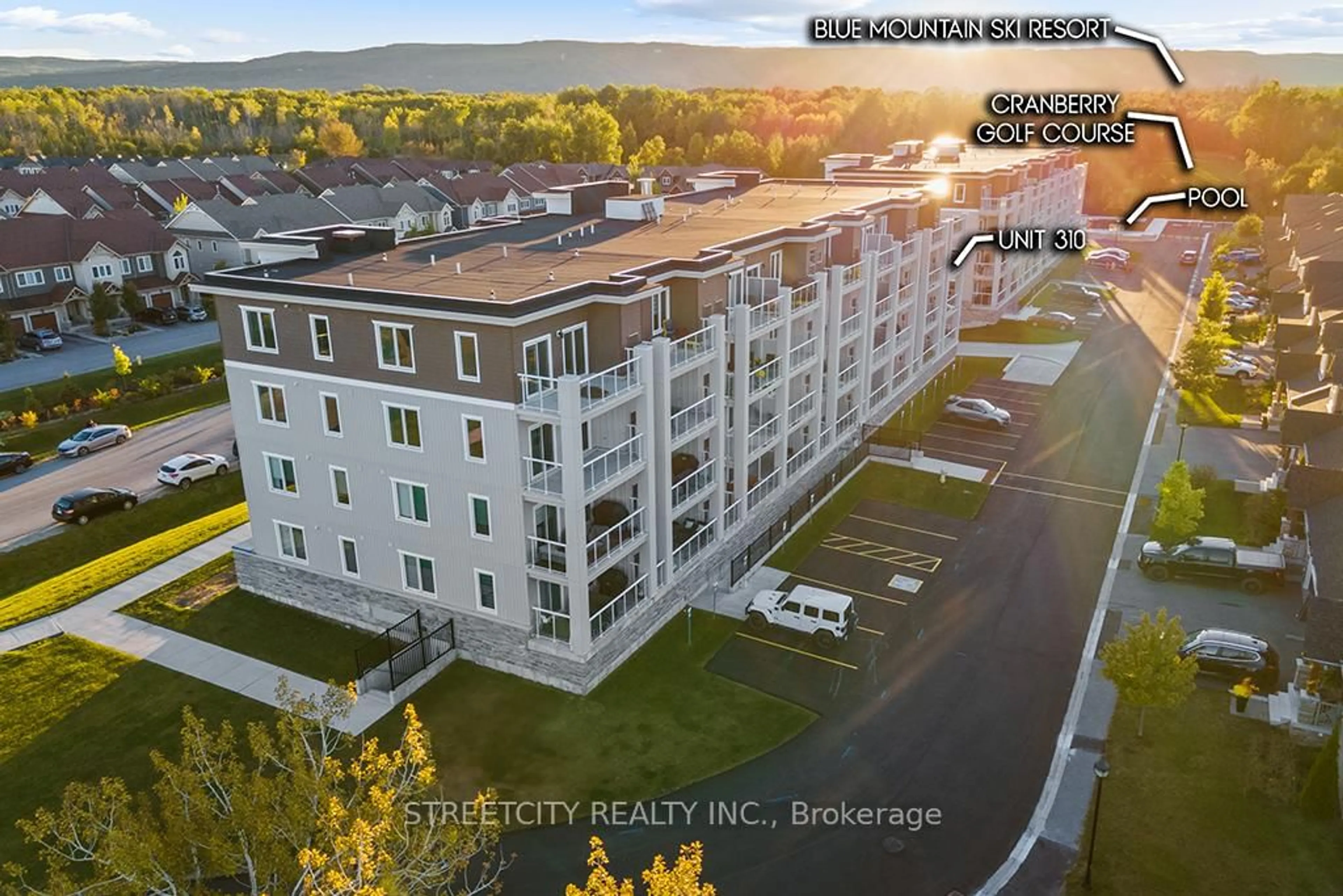 A pic from outside/outdoor area/front of a property/back of a property/a pic from drone, unknown for 5 Spooner Cres #310, Collingwood Ontario L9Y 1T3
