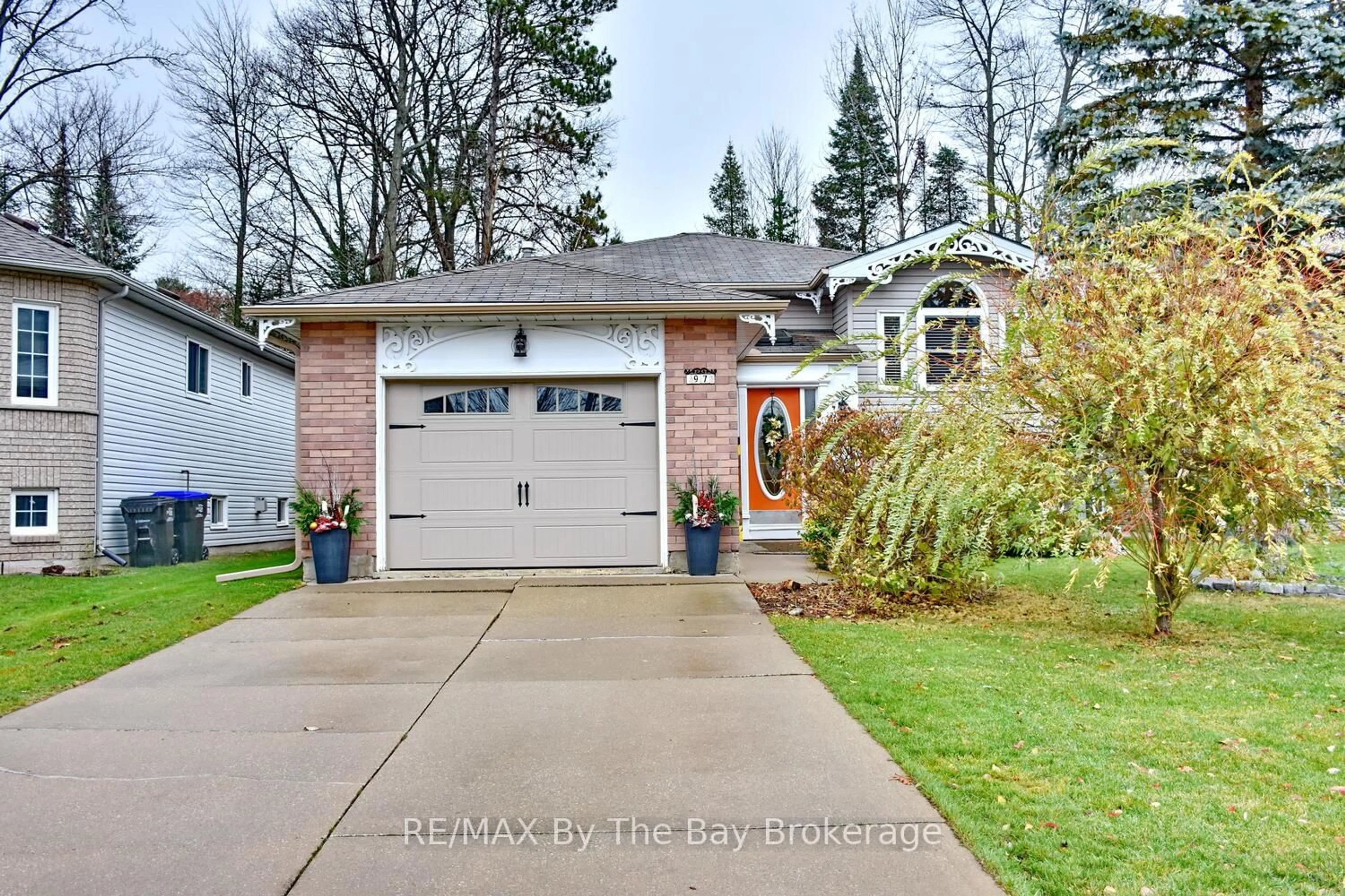 Home with brick exterior material, street for 97 Glen Eton Rd, Wasaga Beach Ontario L9Z 1E8
