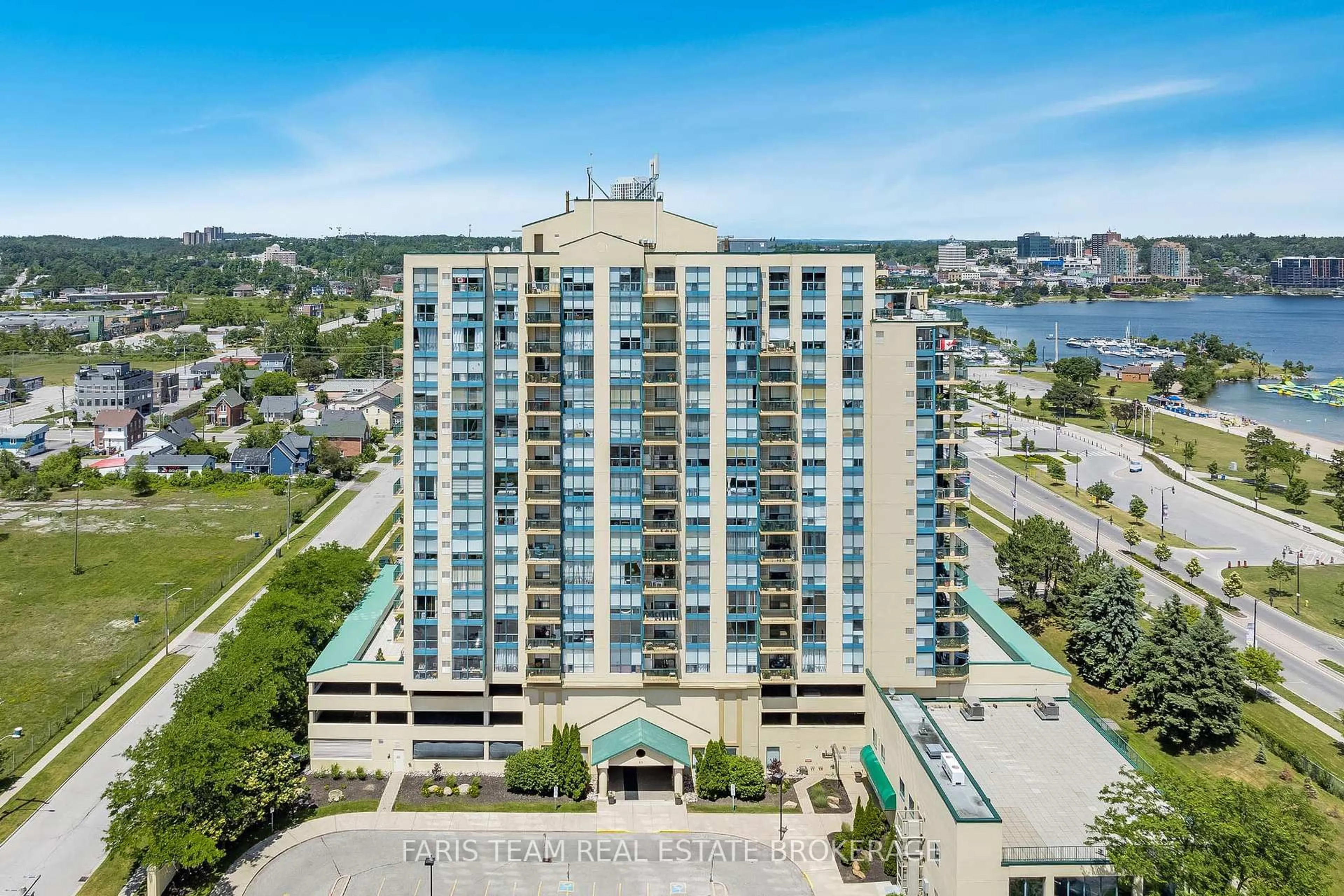 A pic from outside/outdoor area/front of a property/back of a property/a pic from drone, water/lake/river/ocean view for 65 Ellen St #1406, Barrie Ontario L4N 3A5
