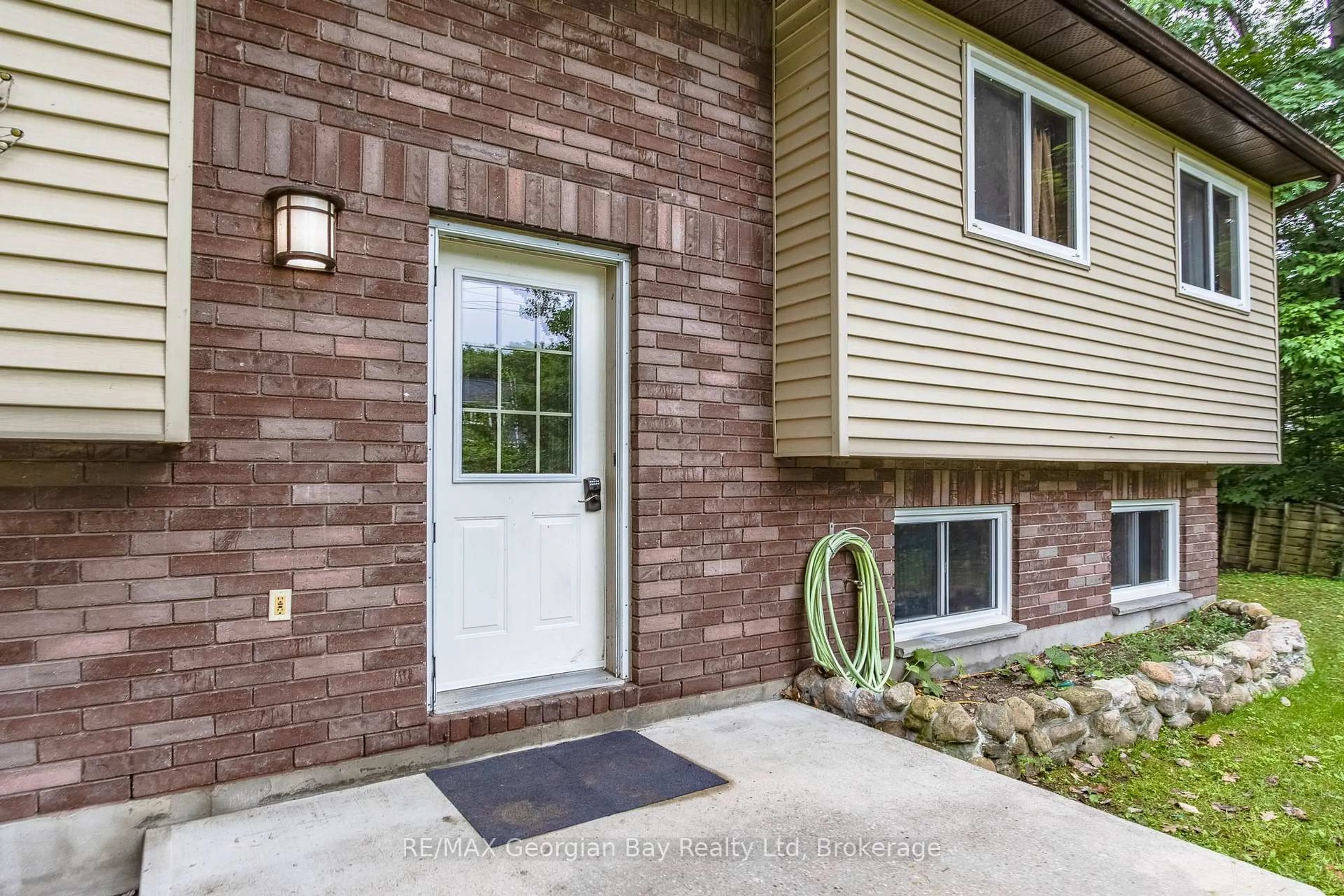 Home with brick exterior material, street for 41 Tucson Rd, Tiny Ontario L9M 0B6