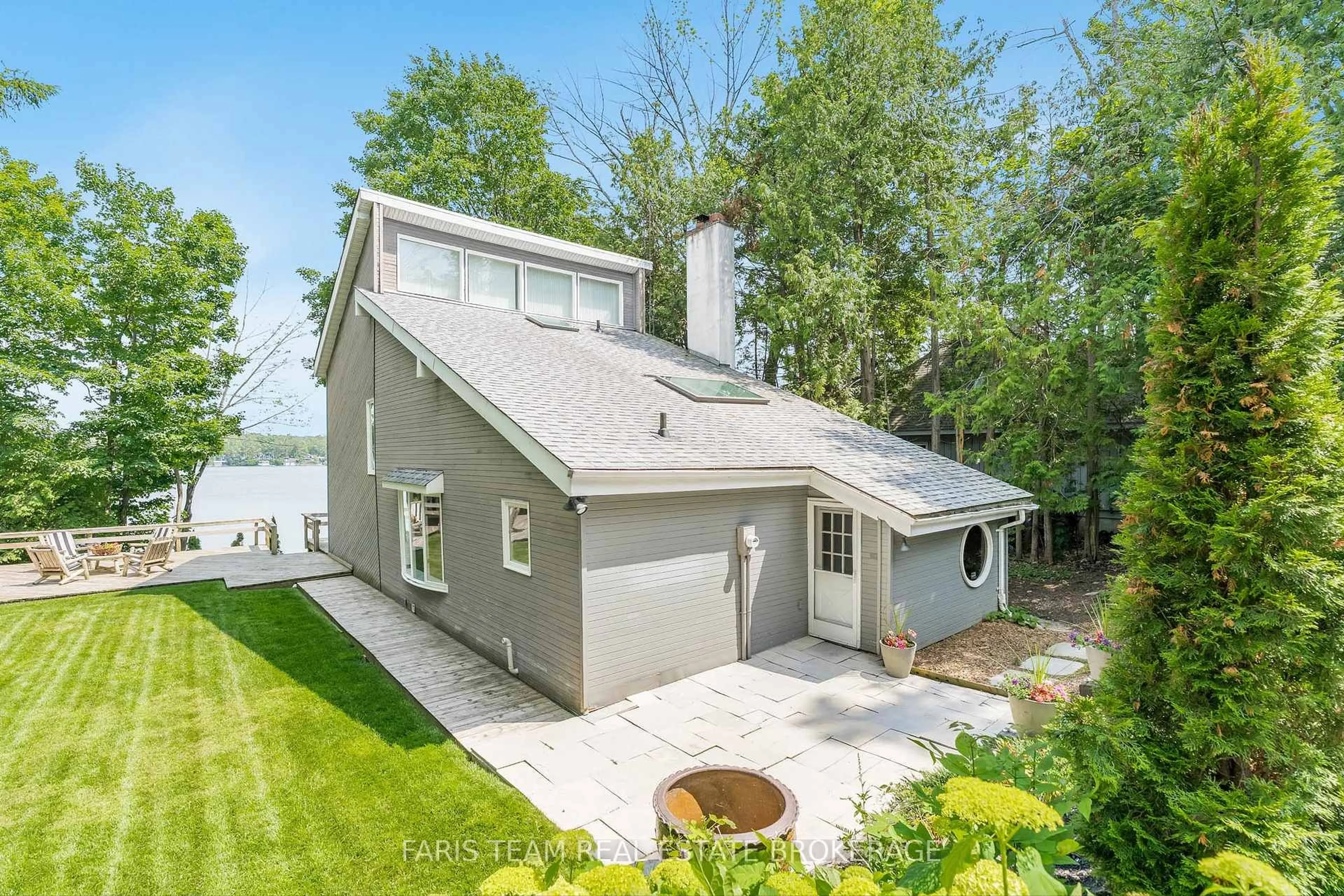 A pic from outside/outdoor area/front of a property/back of a property/a pic from drone, water/lake/river/ocean view for 127 Shoreline Dr, Oro-Medonte Ontario L3V 0K2