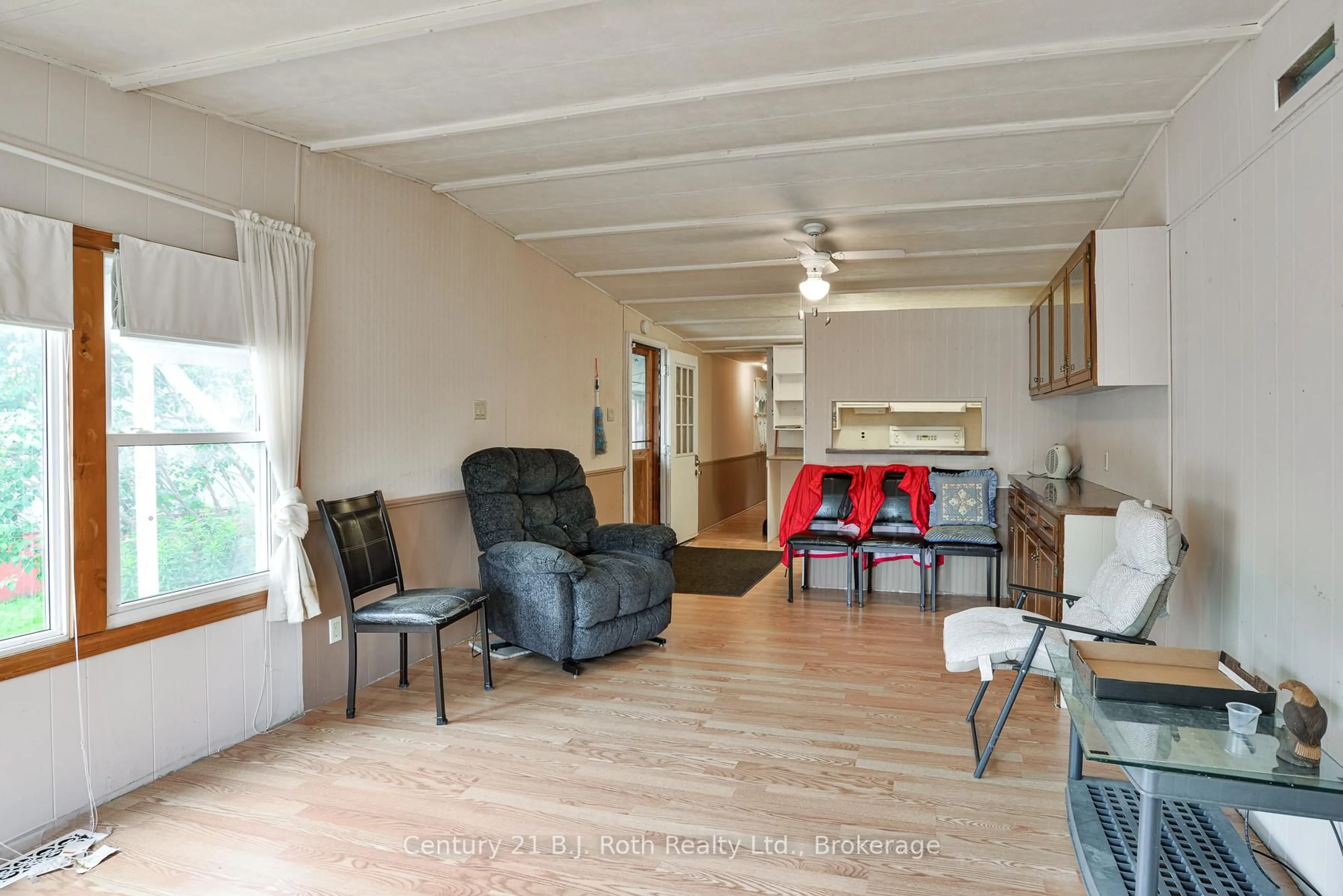 Living room with furniture, wood/laminate floor for 580 West St #178, Orillia Ontario L3V 6L8