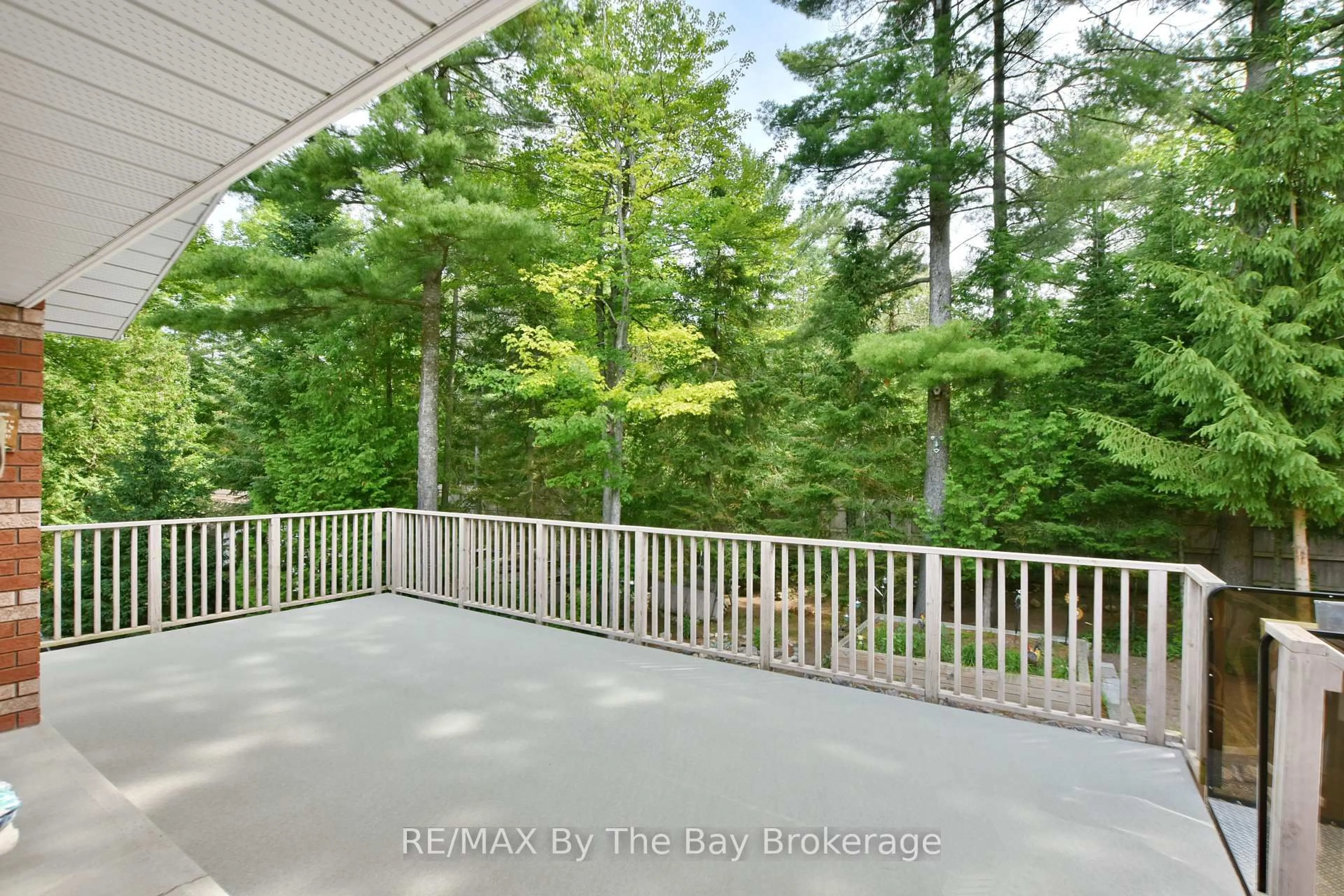 Patio, forest/trees view for 106 Deerbrook Dr, Wasaga Beach Ontario L9Z 2M8