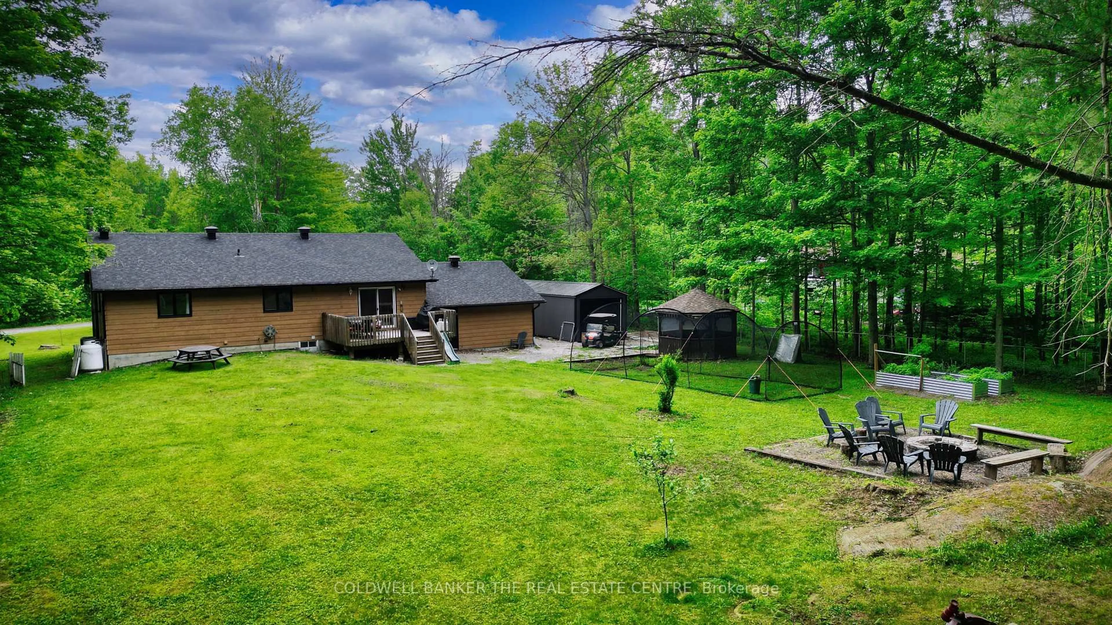 A pic from outside/outdoor area/front of a property/back of a property/a pic from drone, forest/trees view for 4557 Trent Tr, Severn Ontario L0K 2B0