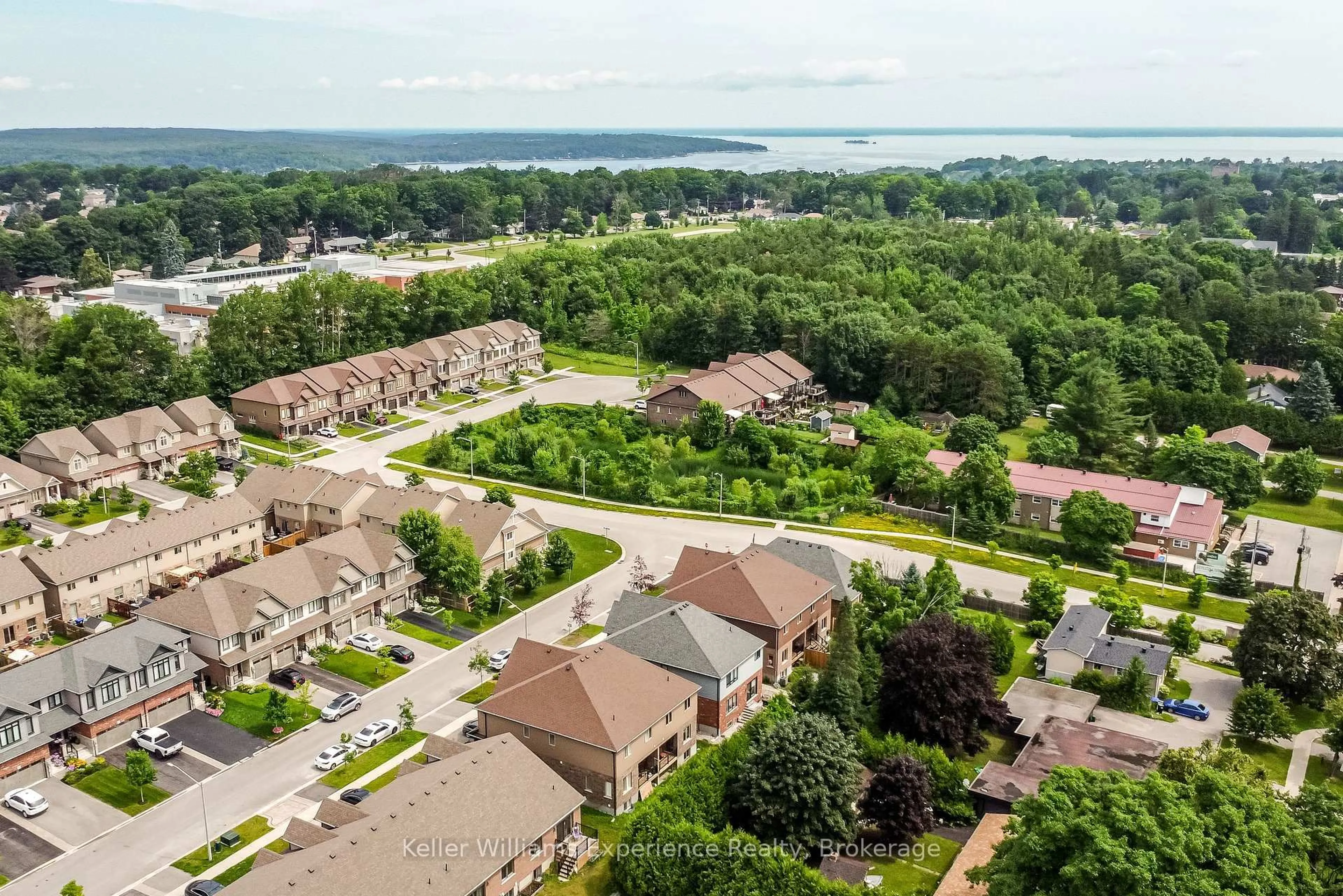A pic from outside/outdoor area/front of a property/back of a property/a pic from drone, water/lake/river/ocean view for 961 Wright Dr, Midland Ontario L4R 0E4