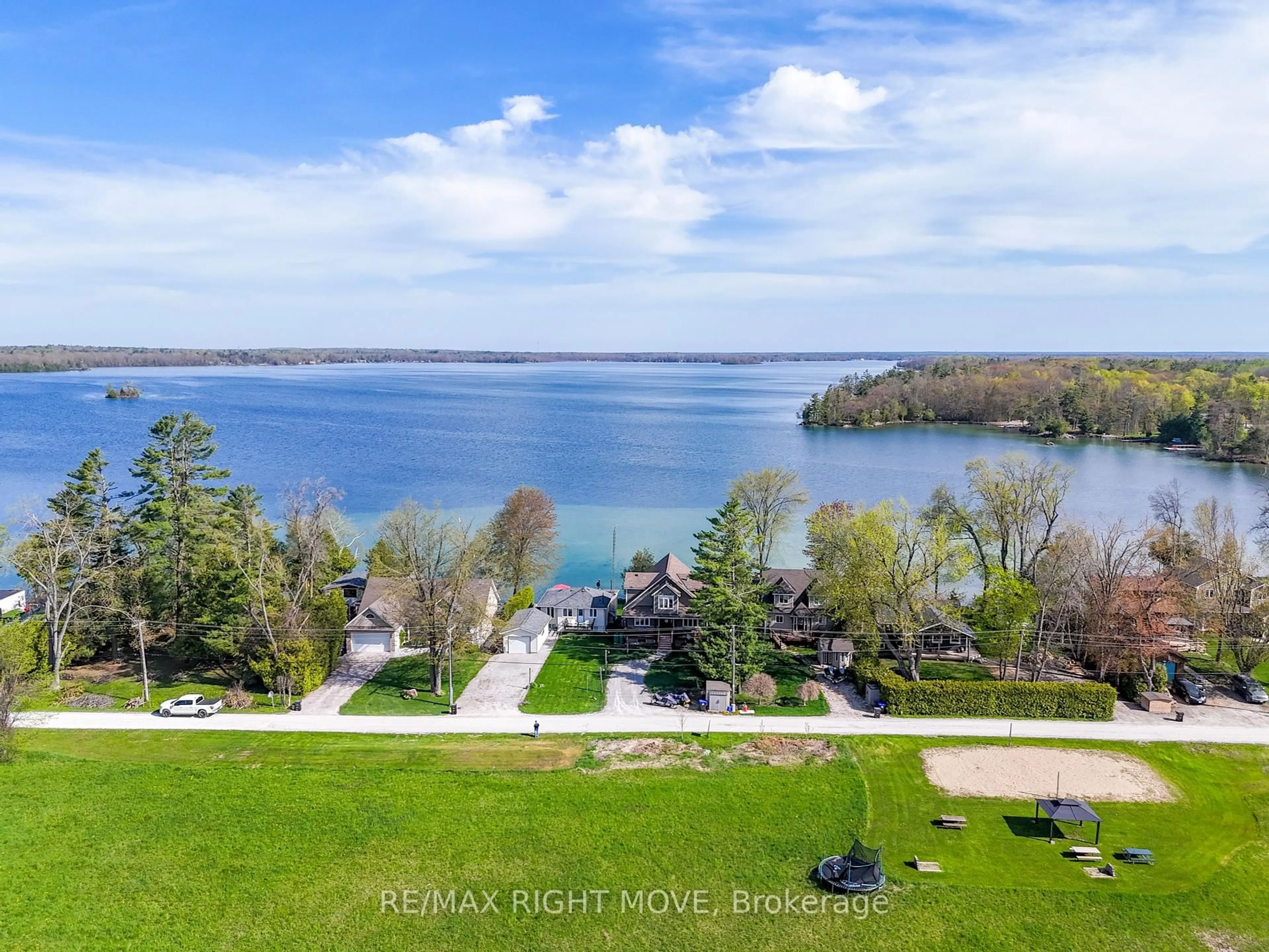 A pic from outside/outdoor area/front of a property/back of a property/a pic from drone, water/lake/river/ocean view for 3752 Portage Bay Rd, Ramara Ontario L0K 2B0