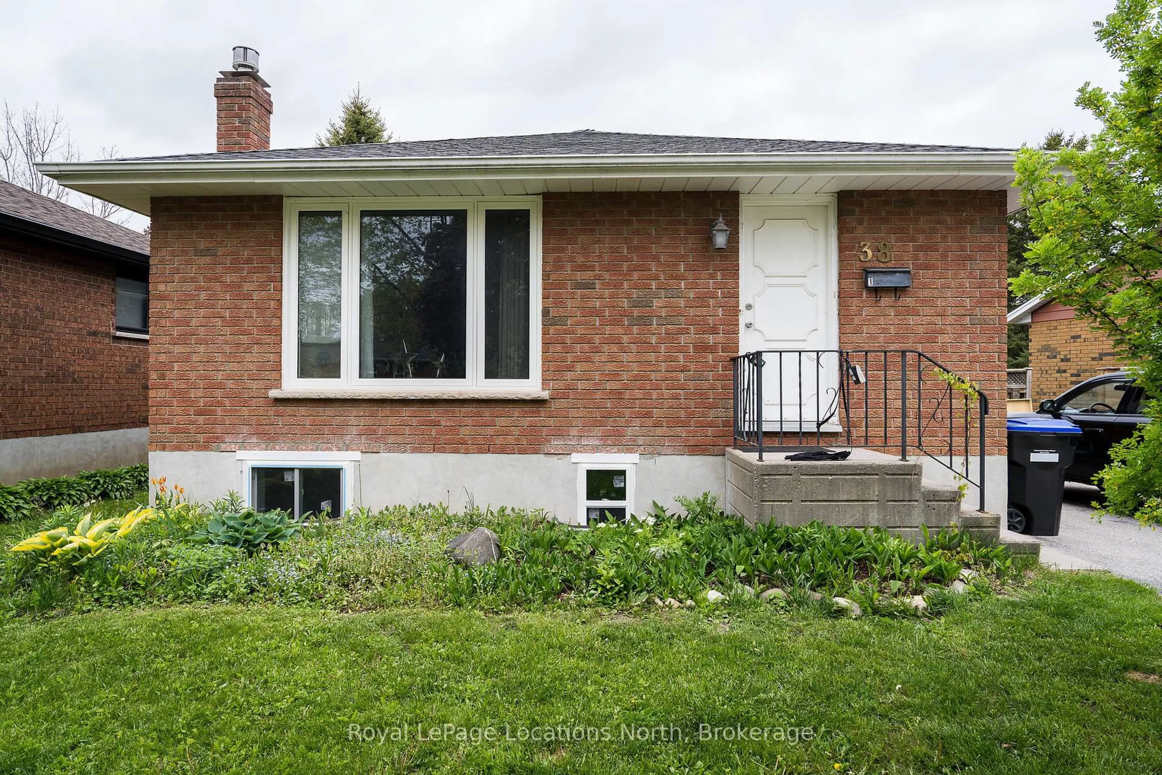 Home with brick exterior material, street for 38 Sproule Ave, Collingwood Ontario L9Y 4L5