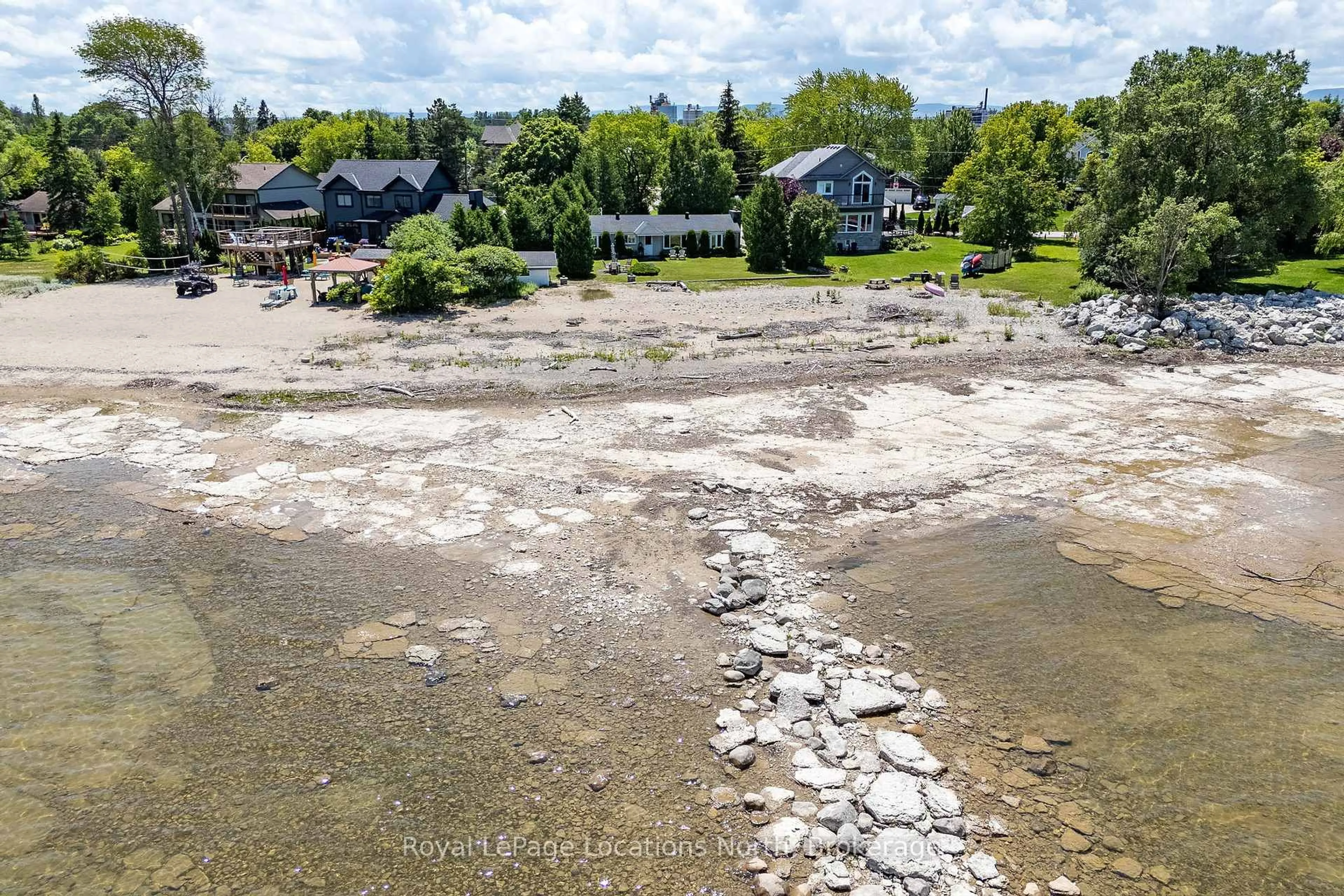 A pic from outside/outdoor area/front of a property/back of a property/a pic from drone, water/lake/river/ocean view for 25 St Clair St, Collingwood Ontario L9Y 3Z1
