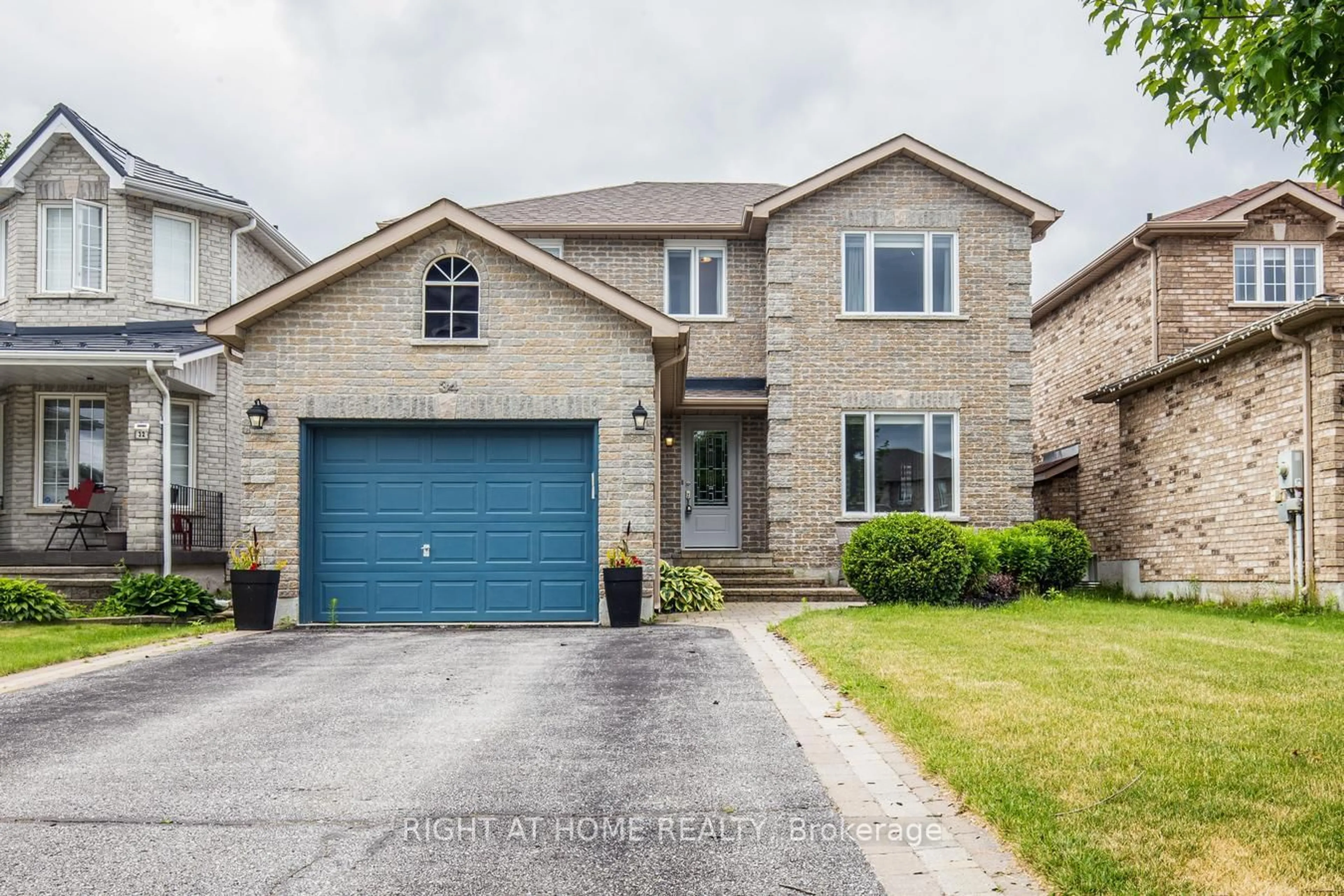 Home with brick exterior material, street for 34 Lang Dr, Barrie Ontario L4N 0W3
