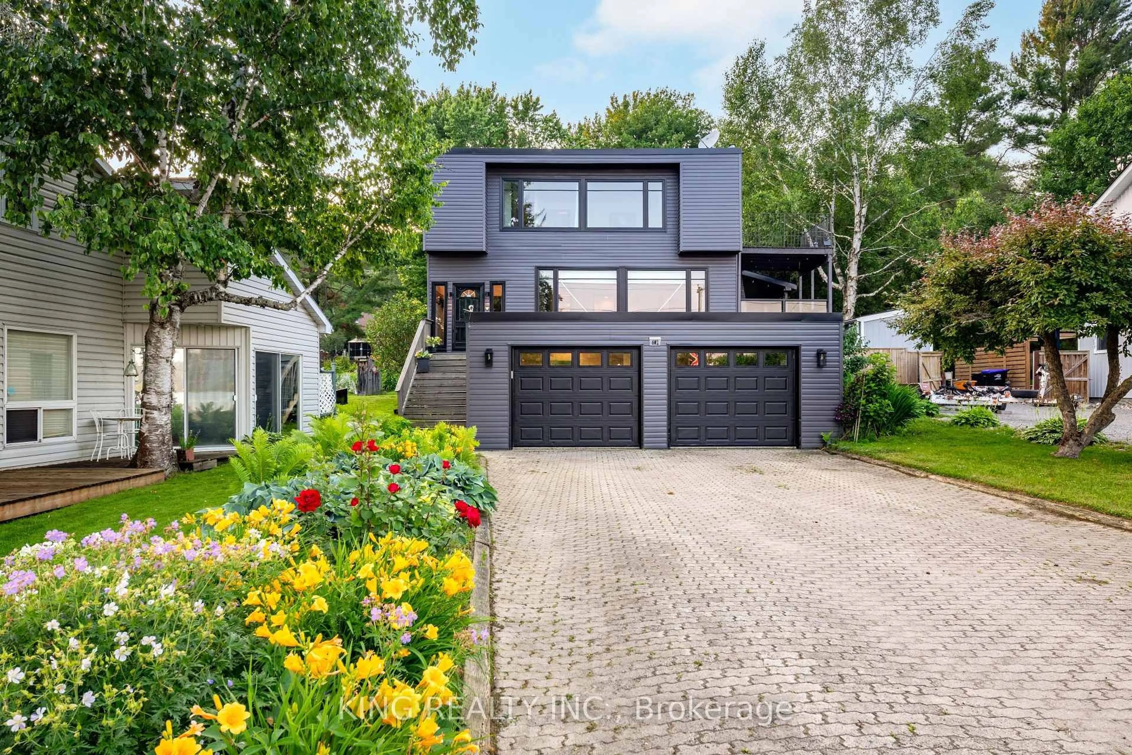 Home with brick exterior material, street for 602 CHAMPLAIN Rd, Tiny Ontario L9M 0C2