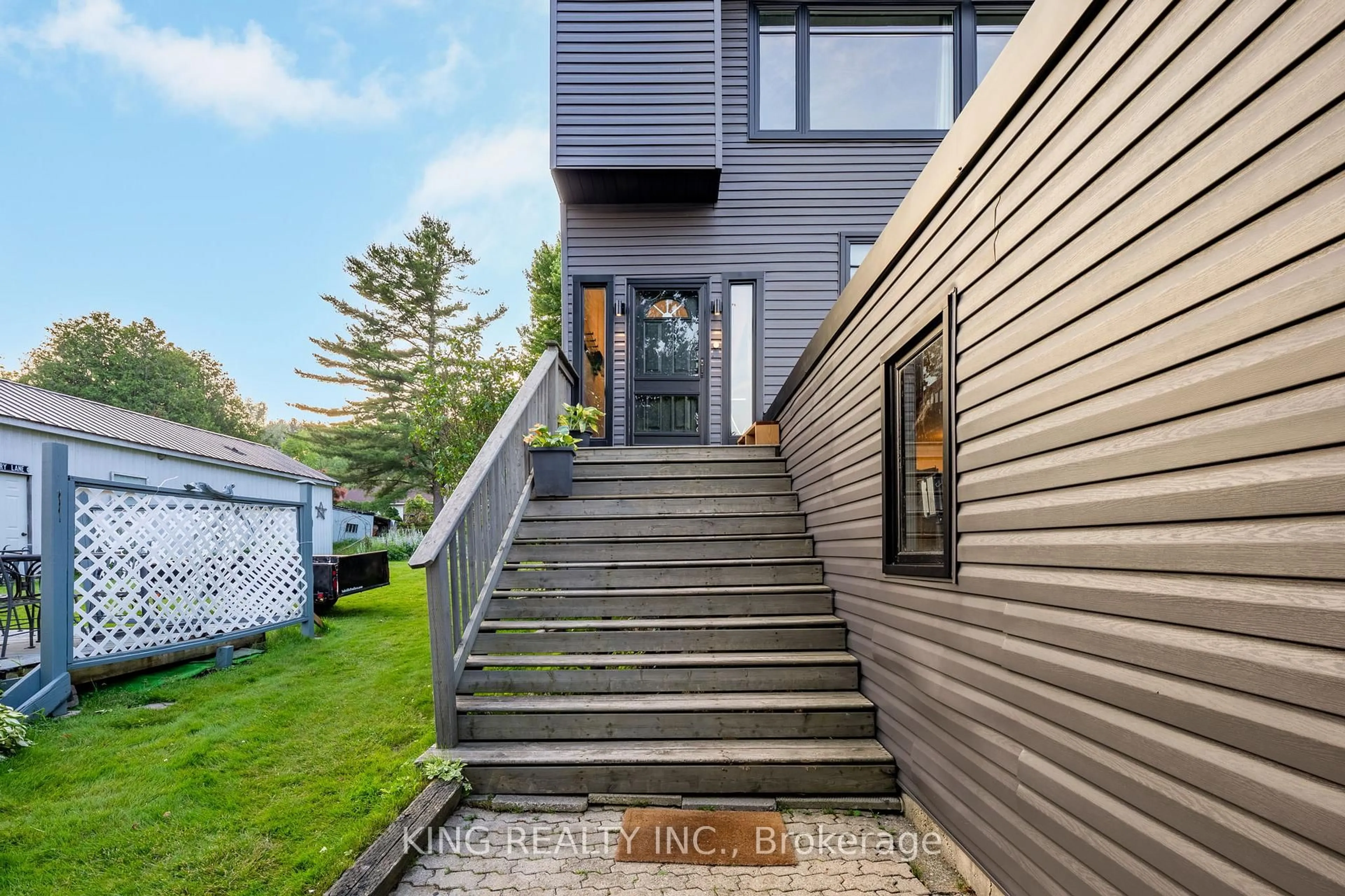 Home with vinyl exterior material, street for 602 CHAMPLAIN Rd, Tiny Ontario L9M 0C2