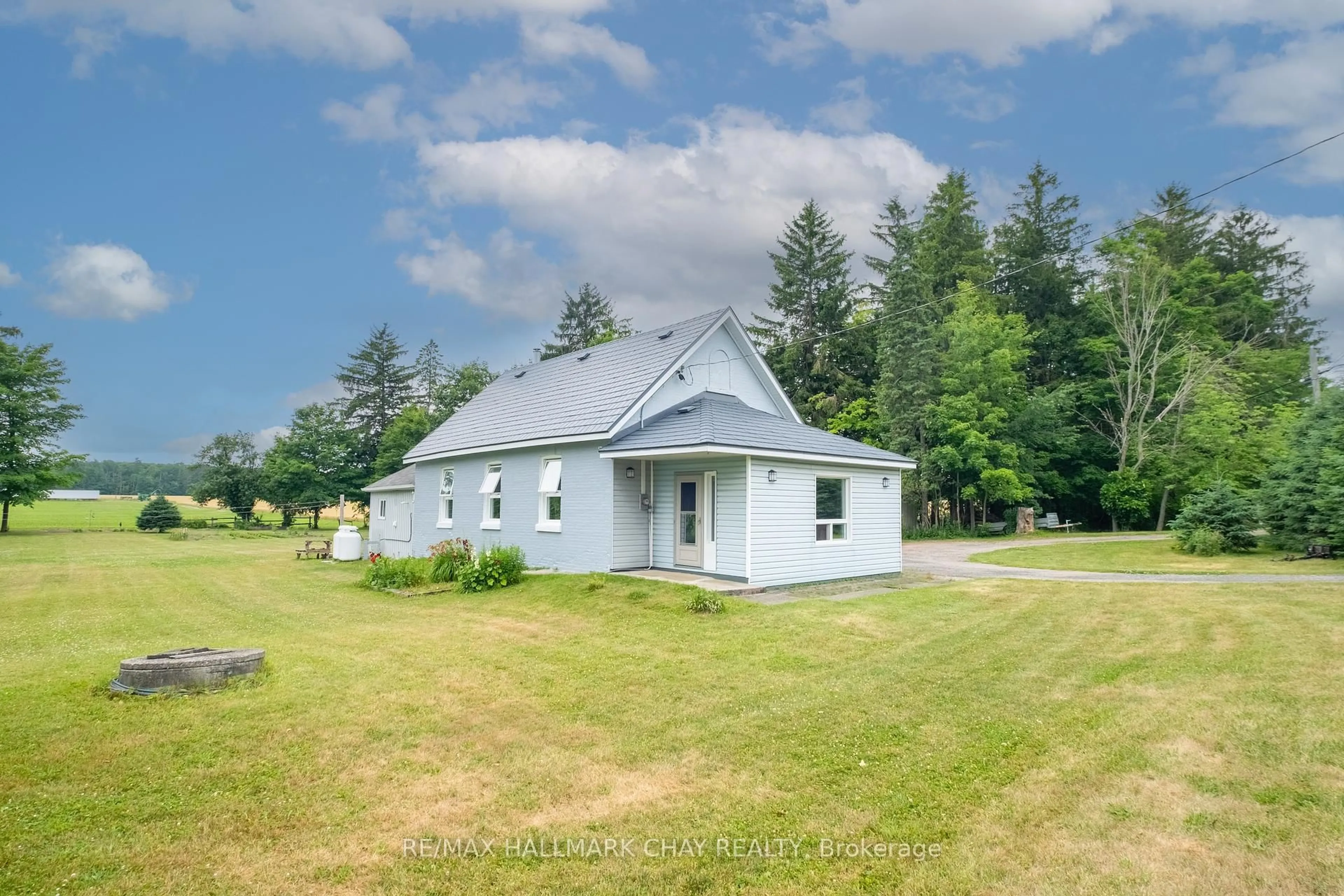 A pic from outside/outdoor area/front of a property/back of a property/a pic from drone, building for 12968 County 27 Rd, Springwater Ontario L0L 2K0