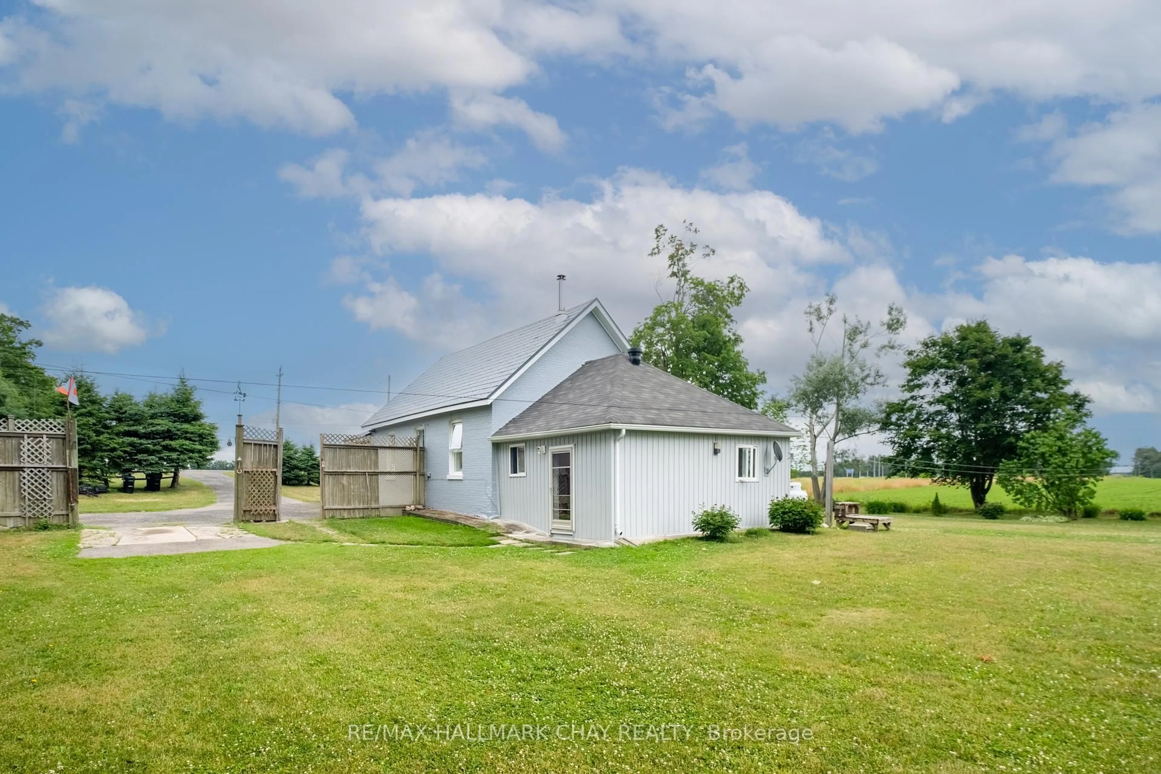 A pic from outside/outdoor area/front of a property/back of a property/a pic from drone, building for 12968 County 27 Rd, Springwater Ontario L0L 2K0