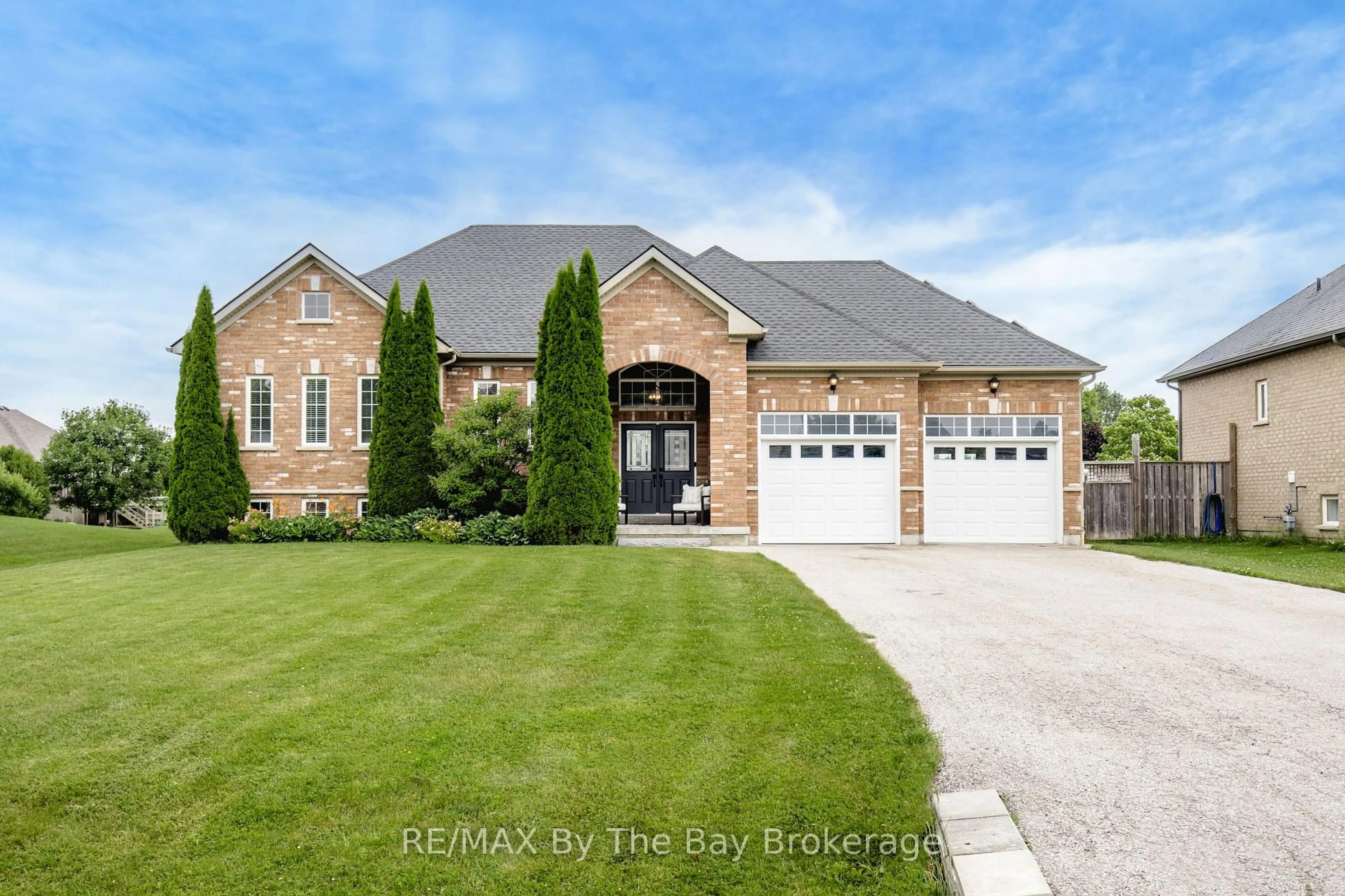 Home with brick exterior material, street for 11 Basswood Dr, Wasaga Beach Ontario L9Z 0A9