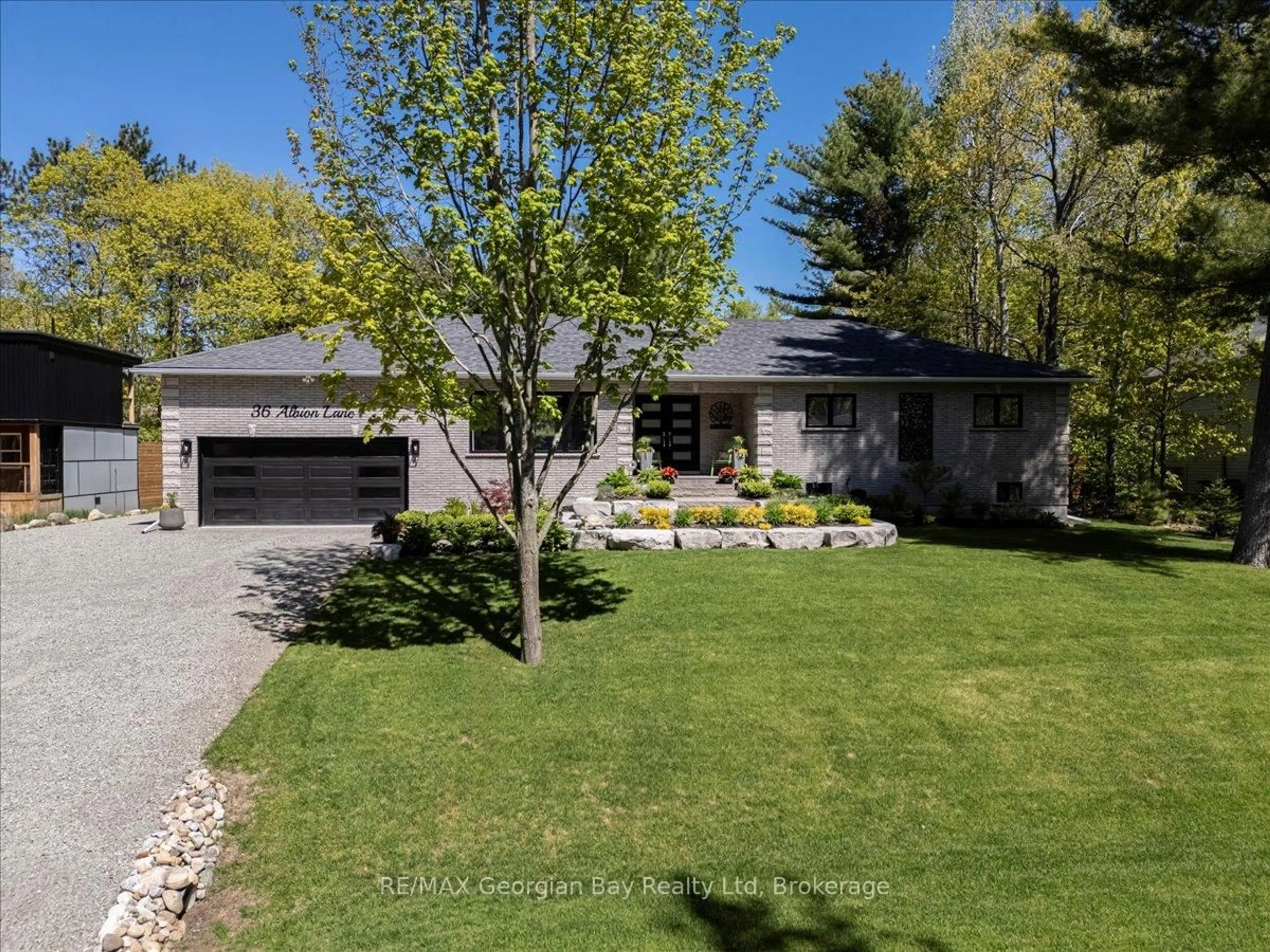 A pic from outside/outdoor area/front of a property/back of a property/a pic from drone, street for 36 ALBION Lane, Tiny Ontario L9M 0J2