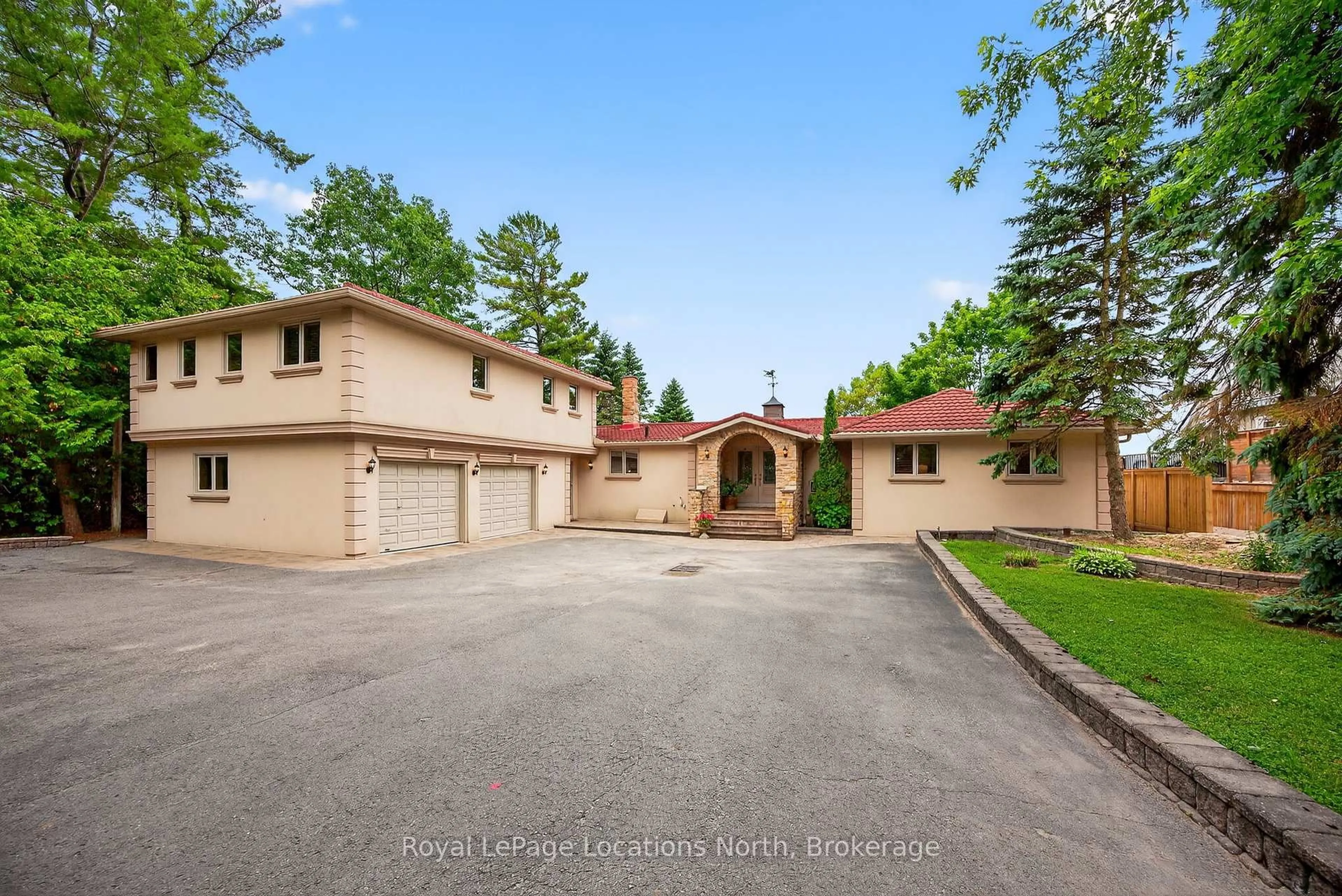 A pic from outside/outdoor area/front of a property/back of a property/a pic from drone, street for 1350 River Rd, Wasaga Beach Ontario L9Z 2R9