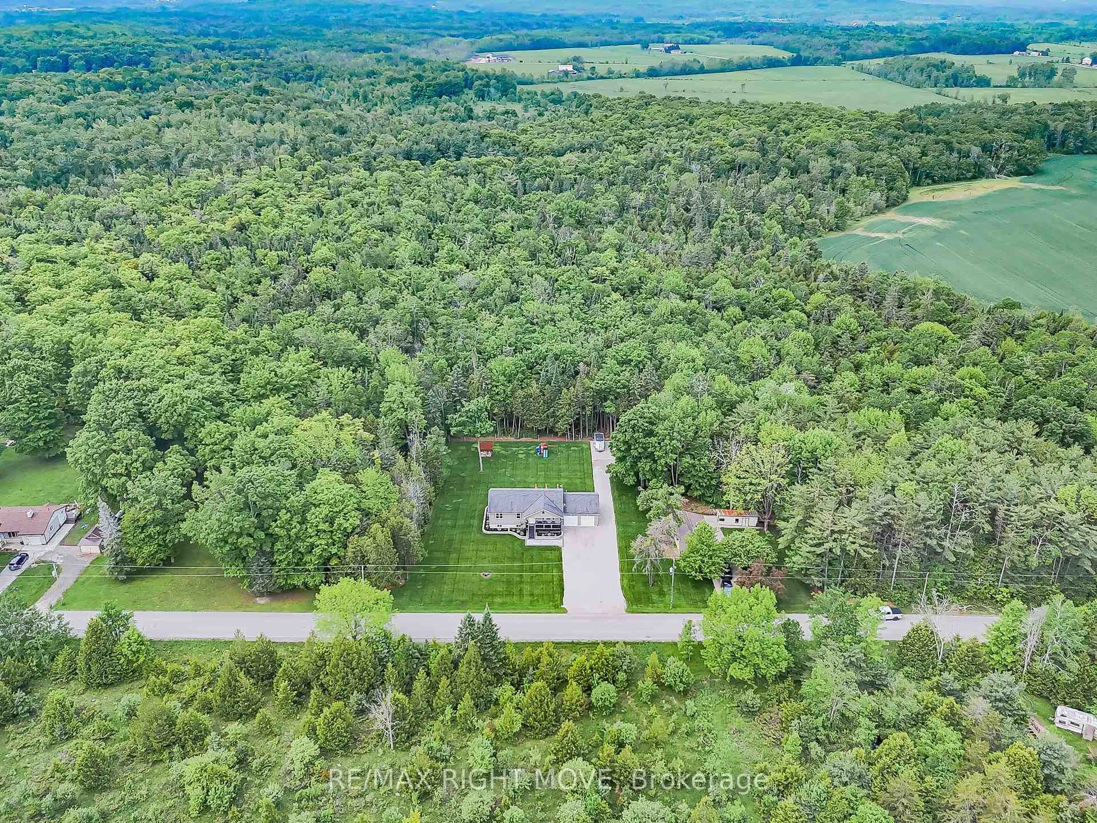 A pic from outside/outdoor area/front of a property/back of a property/a pic from drone, forest/trees view for 1968 Balkwill Line, Severn Ontario L0K 1E0