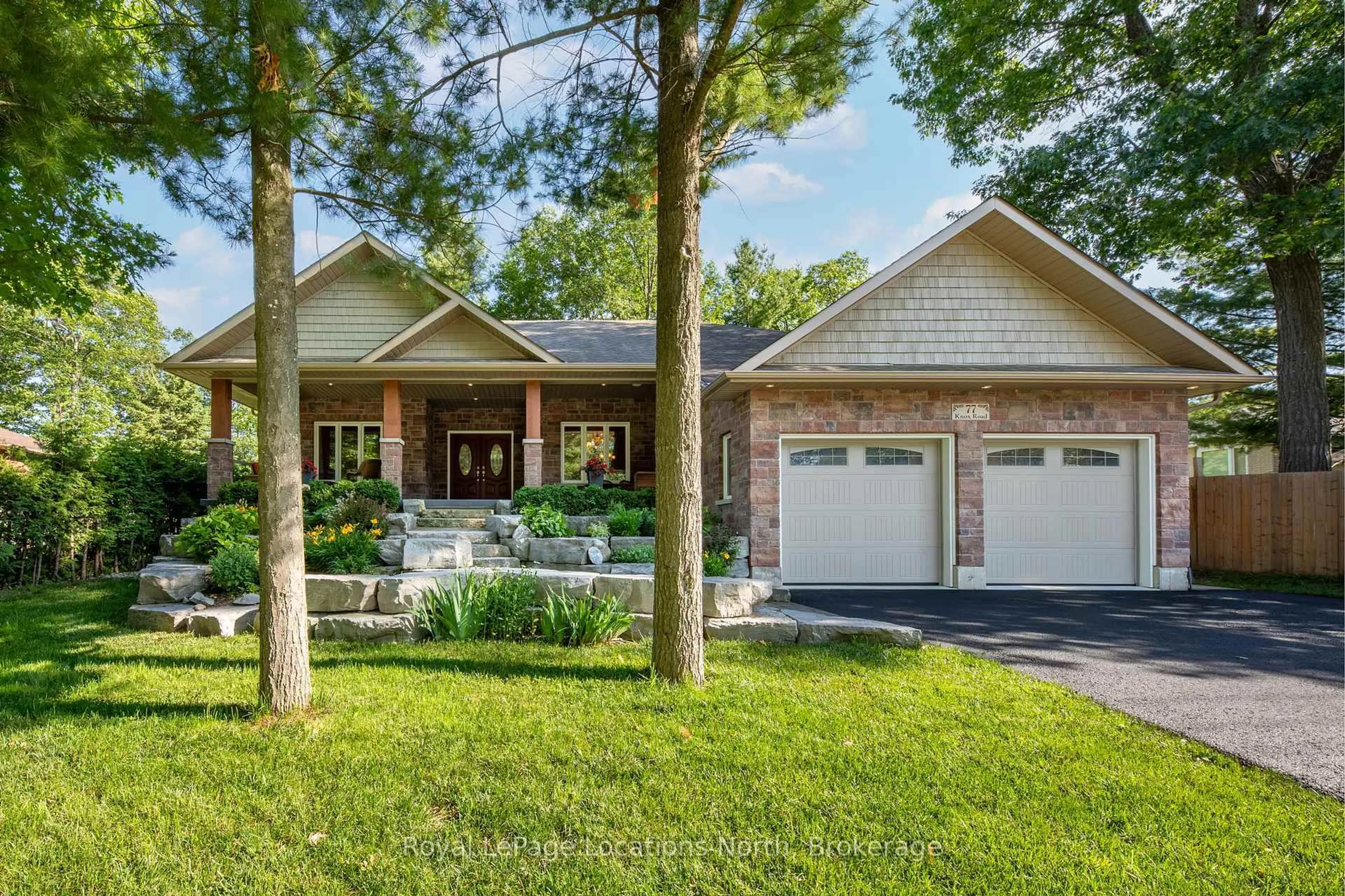 Home with brick exterior material, street for 77 Knox Rd, Wasaga Beach Ontario L9Z 2A8