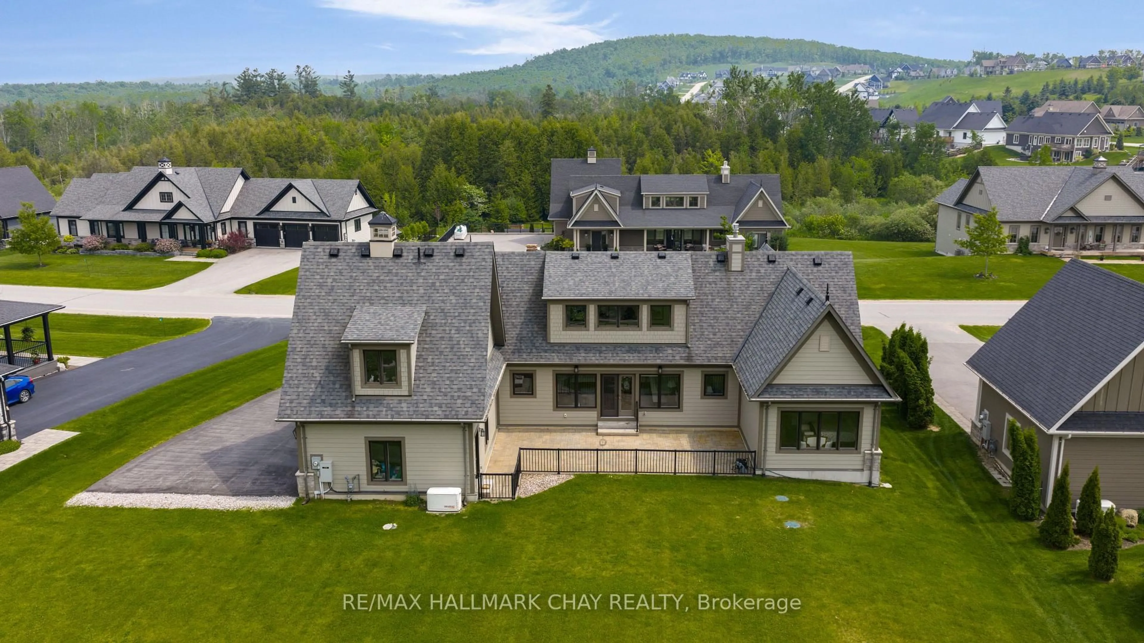 A pic from outside/outdoor area/front of a property/back of a property/a pic from drone, mountain view for 14 Georgian Grande Dr, Oro-Medonte Ontario L0K 1E0