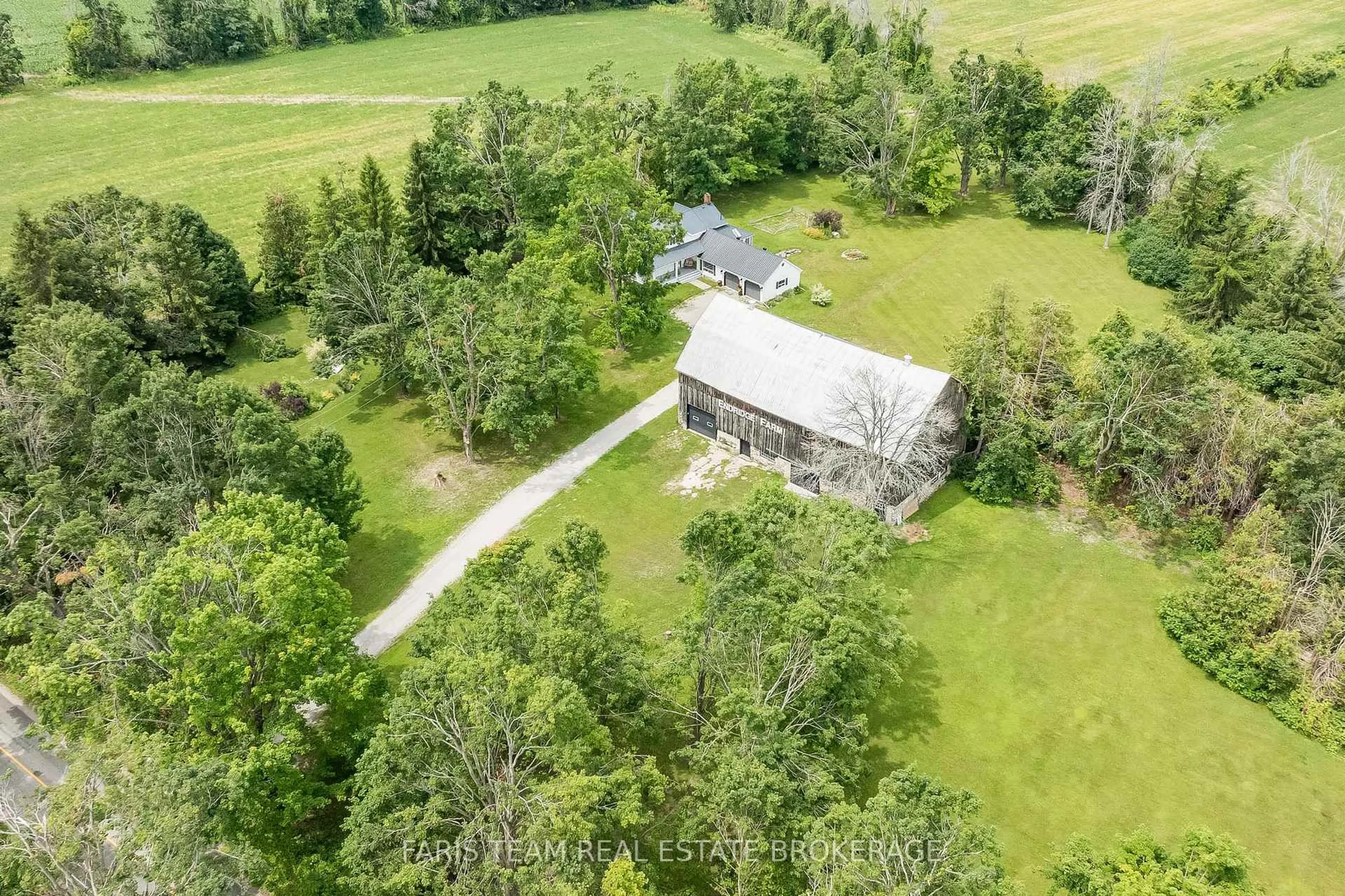 A pic from outside/outdoor area/front of a property/back of a property/a pic from drone, unknown for 2462 Ridge Rd, Oro-Medonte Ontario L0L 1T0