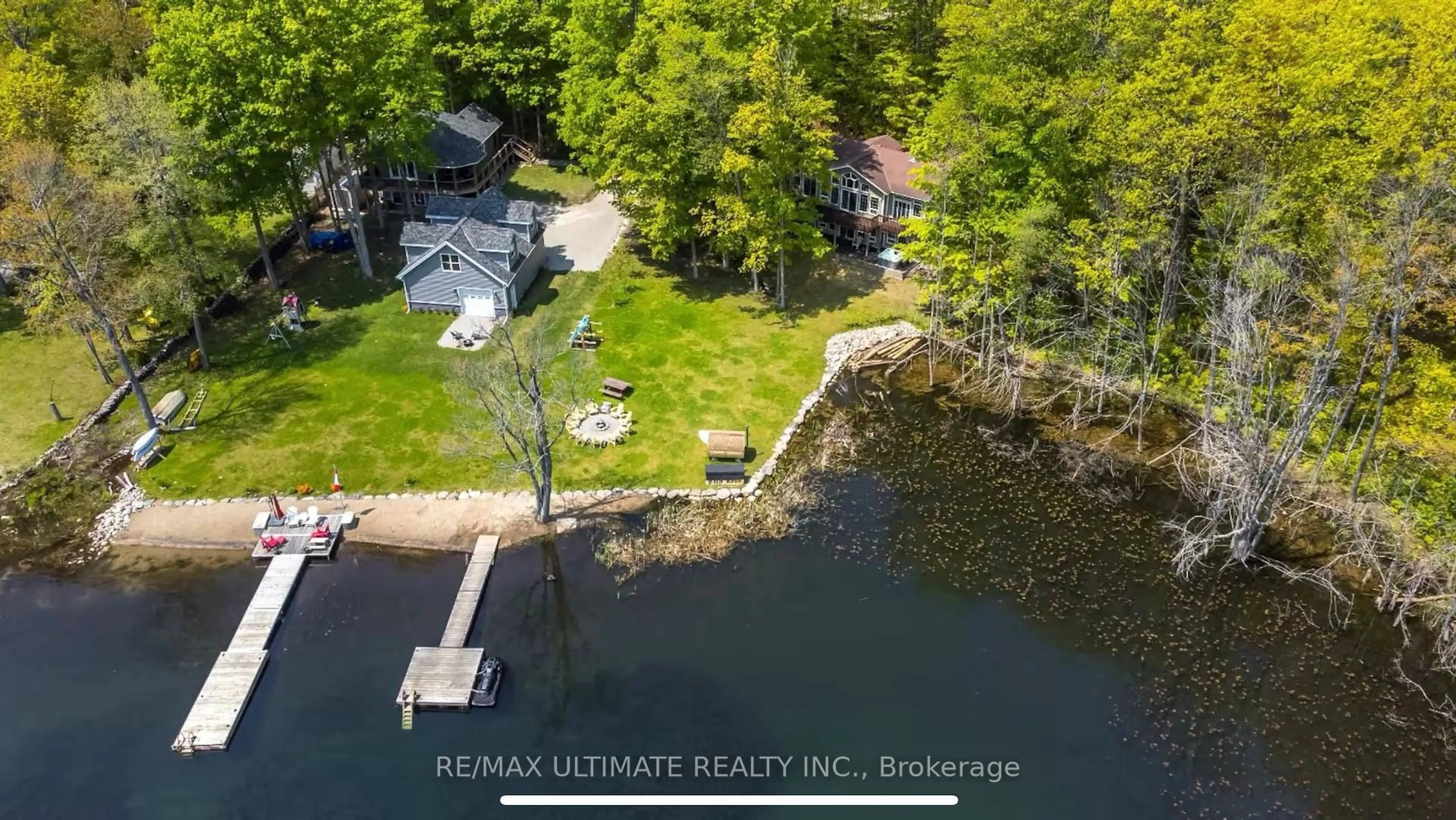 A pic from outside/outdoor area/front of a property/back of a property/a pic from drone, water/lake/river/ocean view for 157 Farlain Lake Rd, Tiny Ontario L9M 0B9