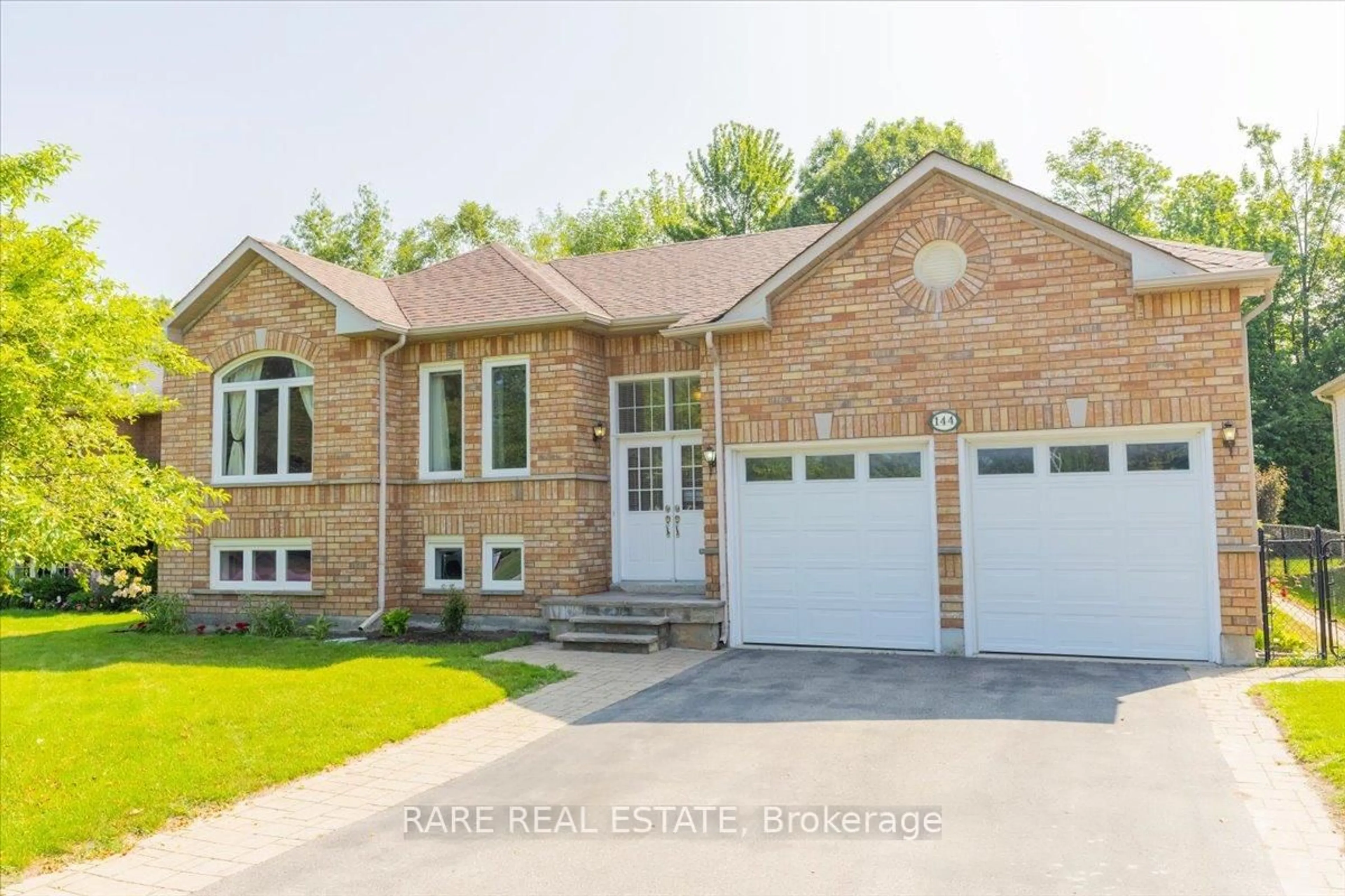 Home with brick exterior material, street for 144 Silver Birch Ave, Wasaga Beach Ontario L9Z 1N3