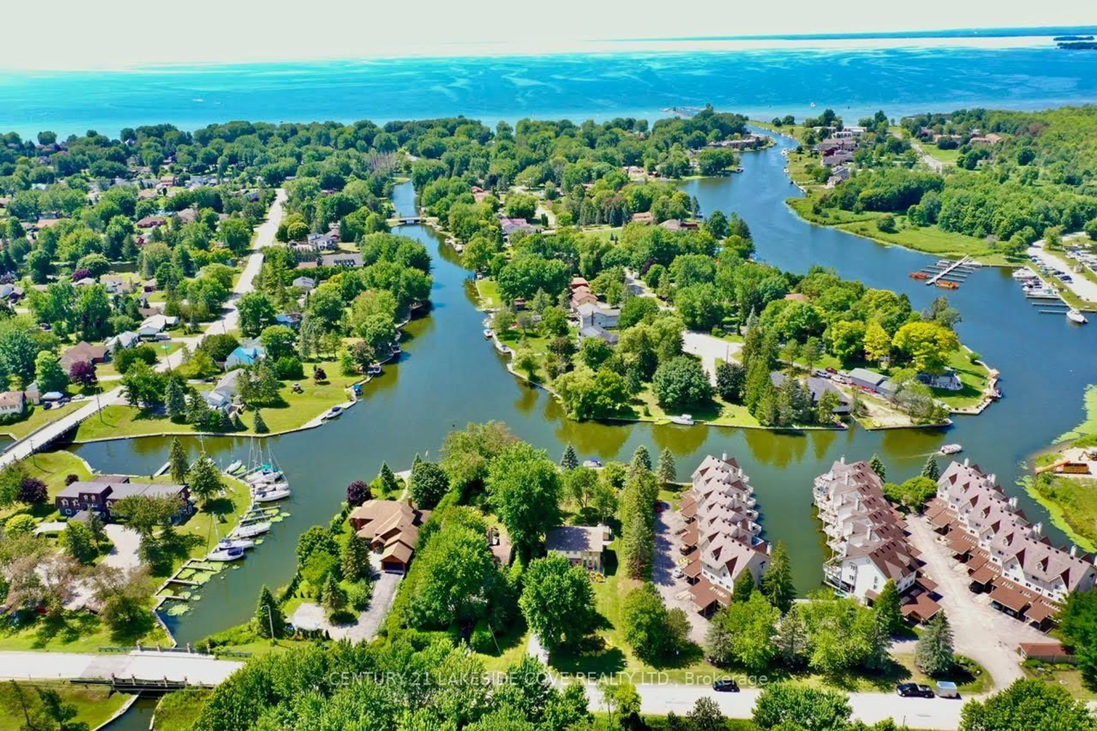 A pic from outside/outdoor area/front of a property/back of a property/a pic from drone, water/lake/river/ocean view for 100 Laguna Pkwy #23, Ramara Ontario L0K 1B0