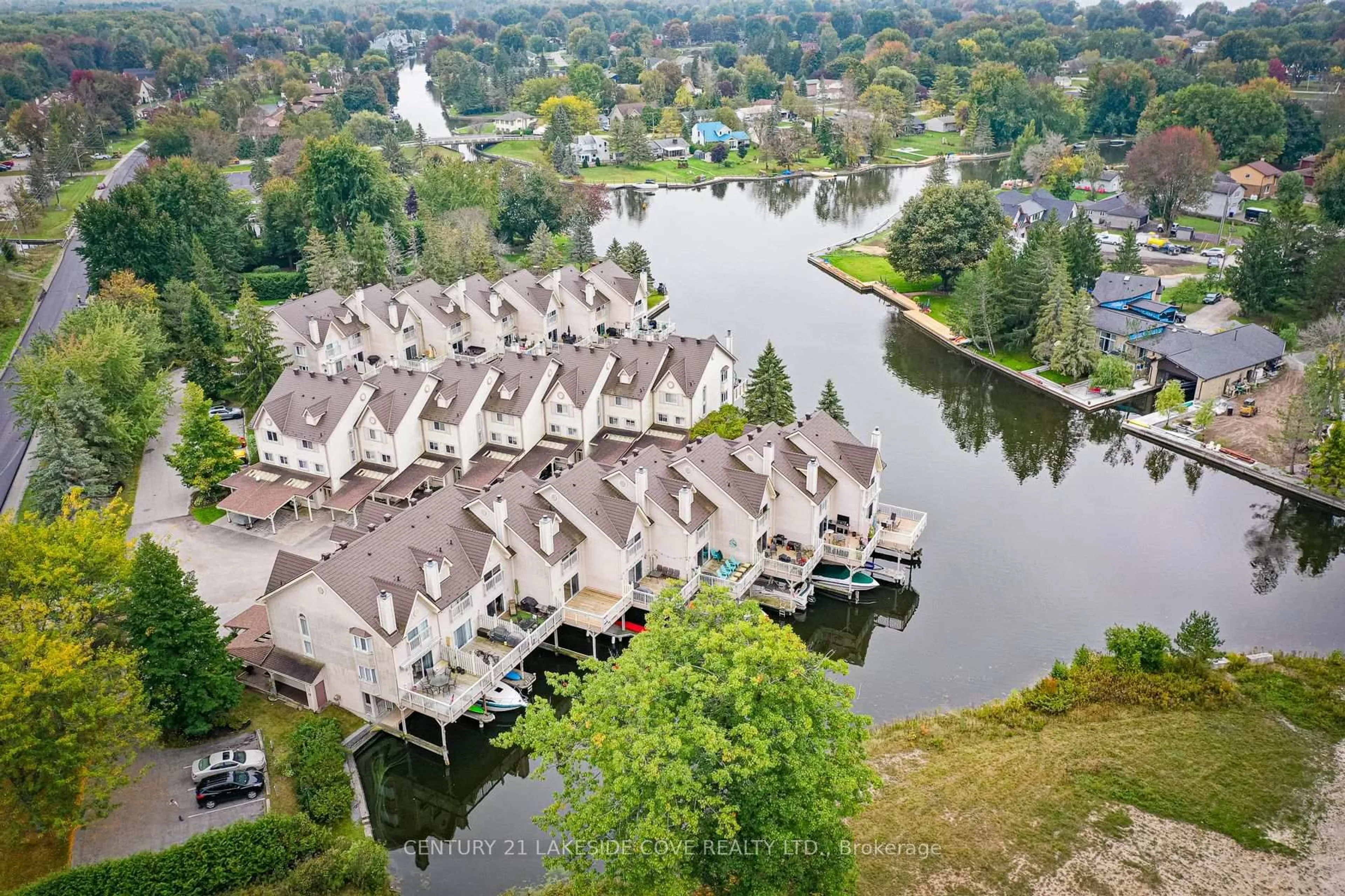 A pic from outside/outdoor area/front of a property/back of a property/a pic from drone, water/lake/river/ocean view for 100 Laguna Pkwy #23, Ramara Ontario L0K 1B0