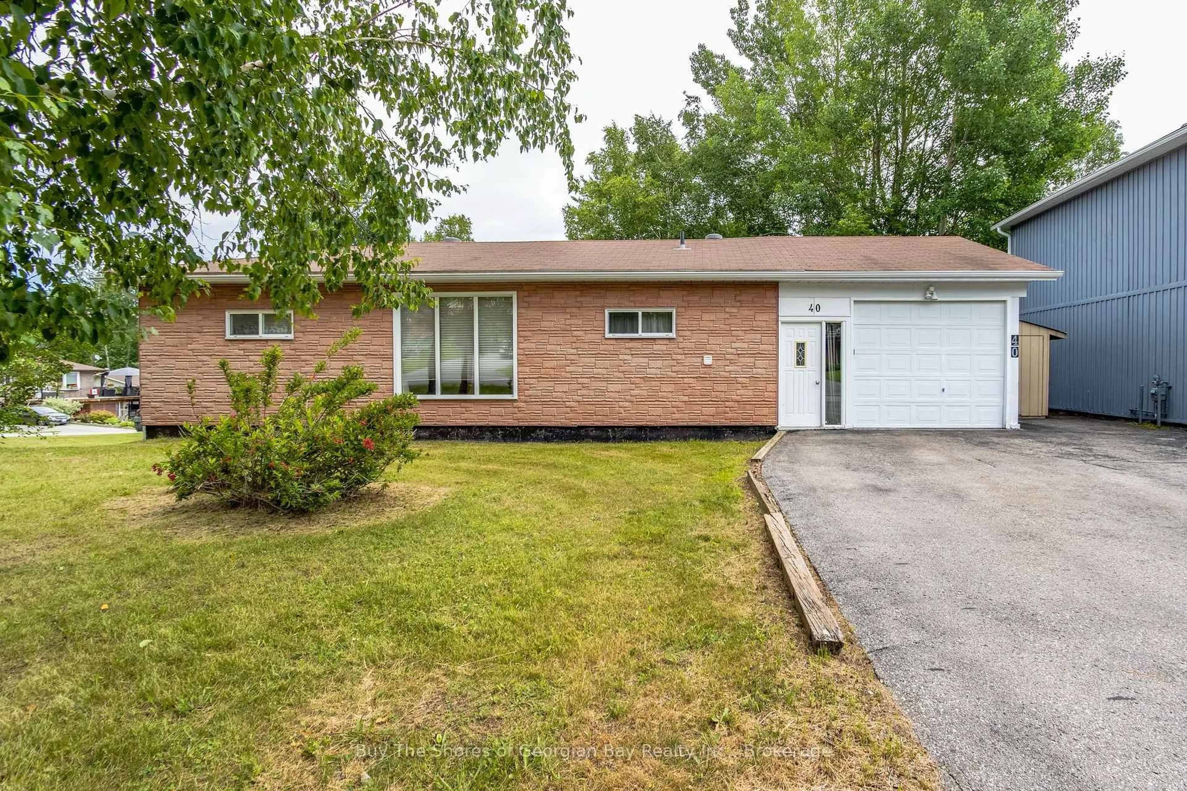 Home with brick exterior material, street for 40 Lepage Dr, Penetanguishene Ontario L9M 1R5