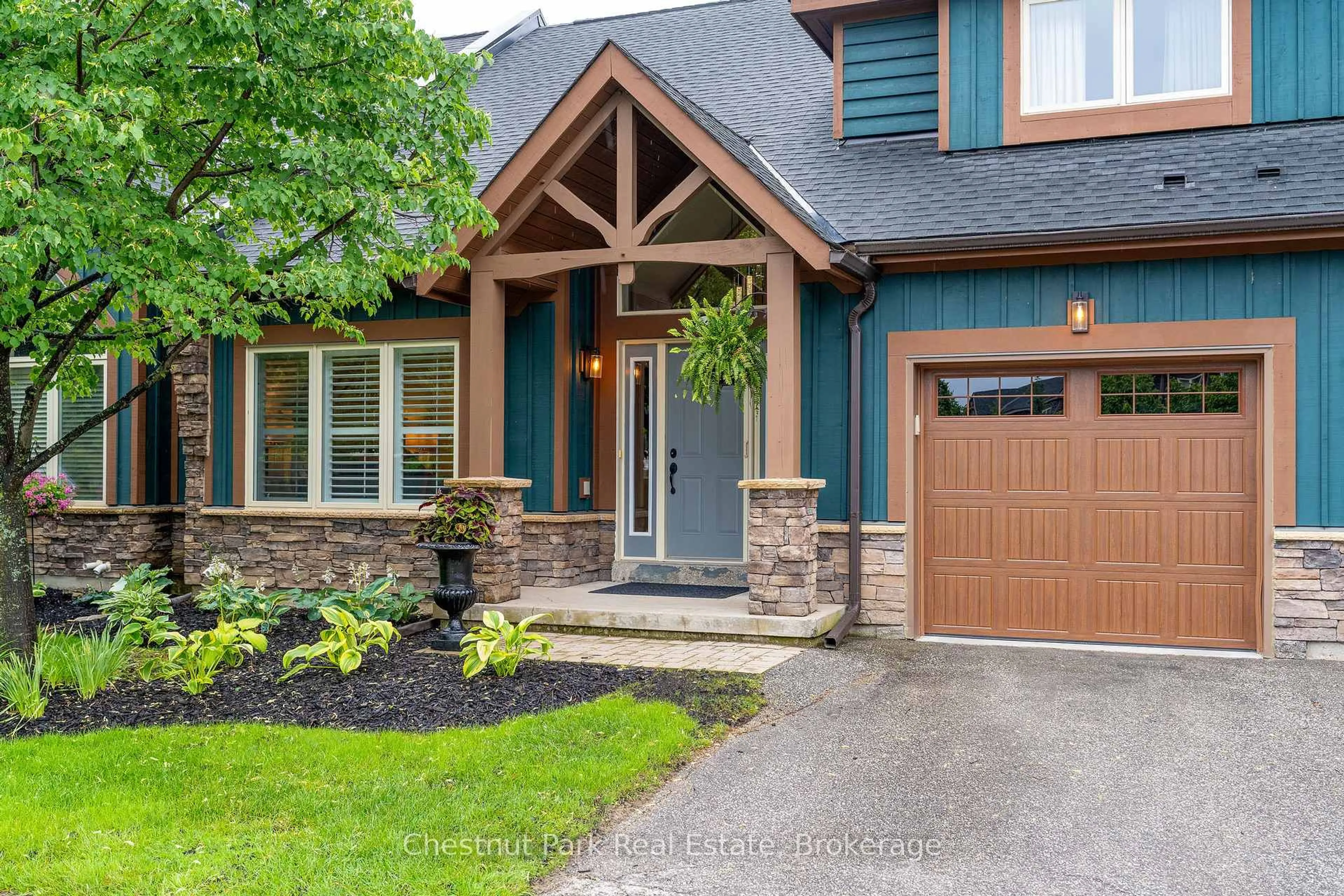 Home with brick exterior material, street for 12 Jeffreys Way, Collingwood Ontario L9Y 0J4
