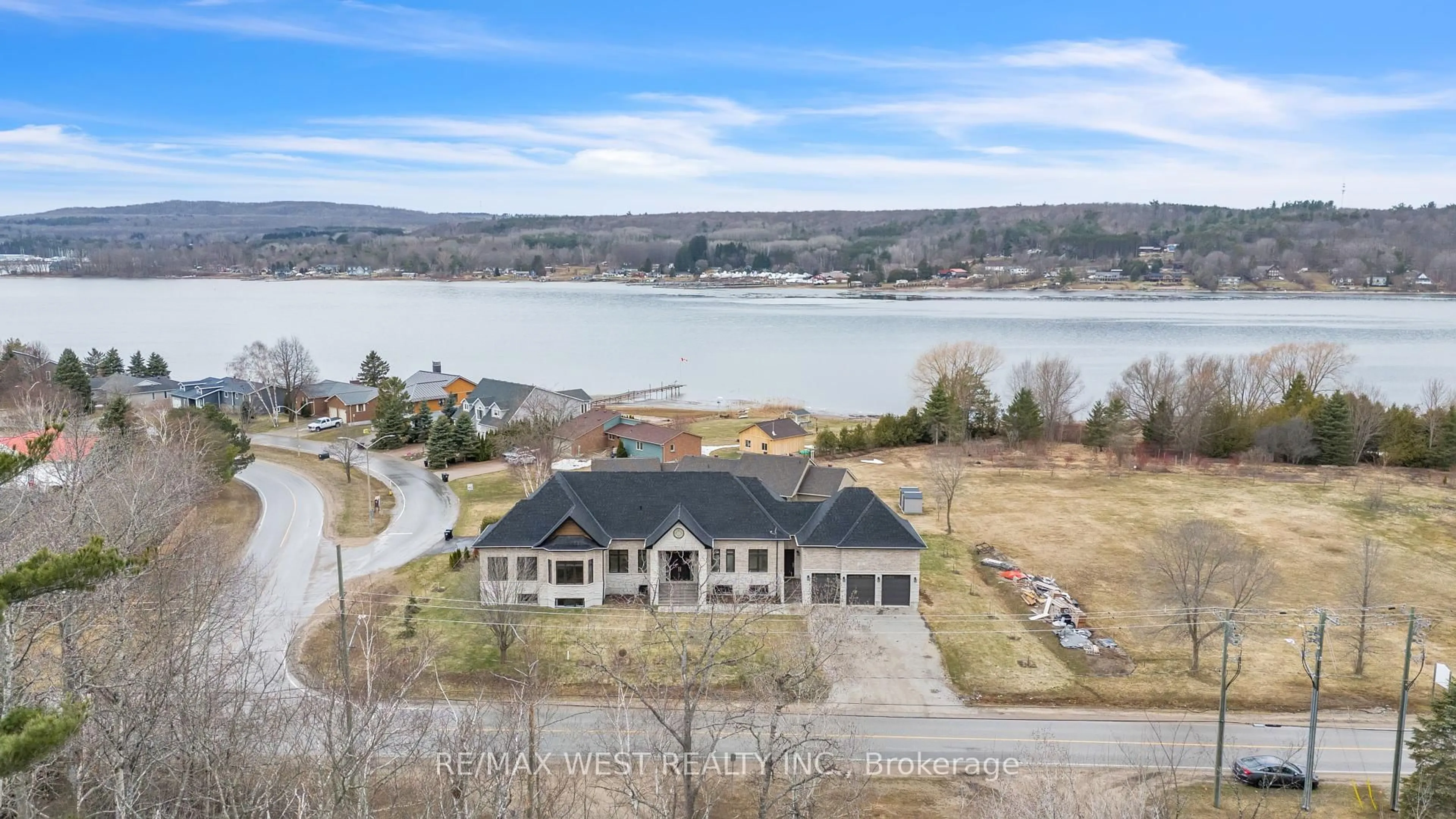 A pic from outside/outdoor area/front of a property/back of a property/a pic from drone, water/lake/river/ocean view for 132 Fox St, Penetanguishene Ontario L9M 1E7