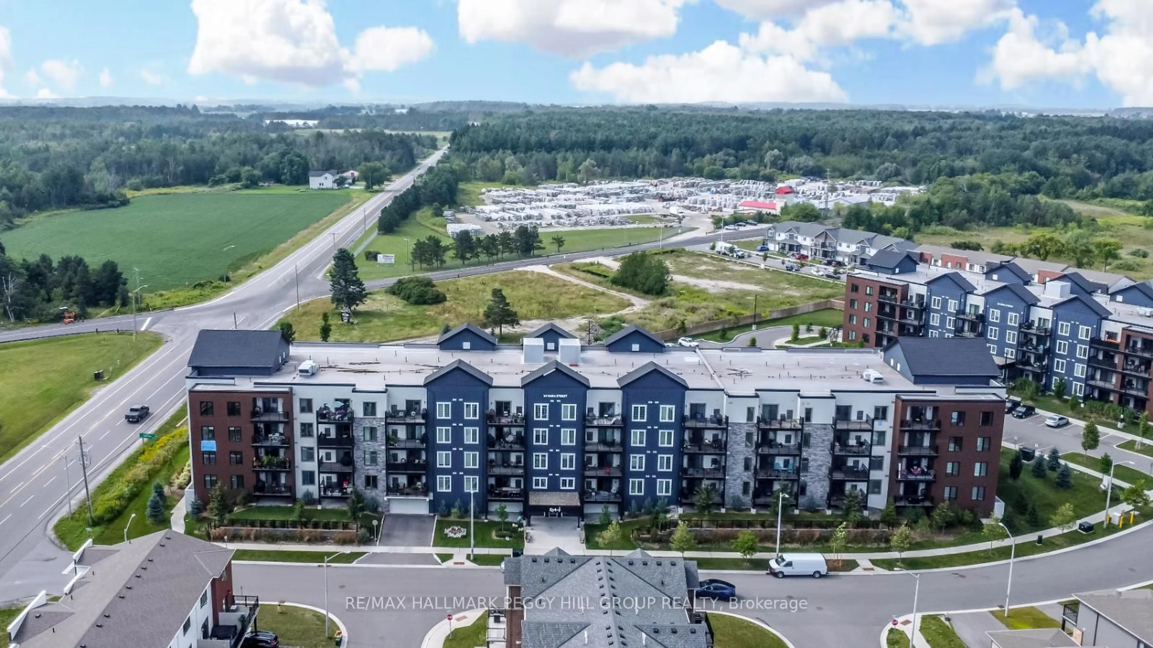 A pic from outside/outdoor area/front of a property/back of a property/a pic from drone, city buildings view from balcony for 54 Koda St #112, Barrie Ontario L9J 0J6