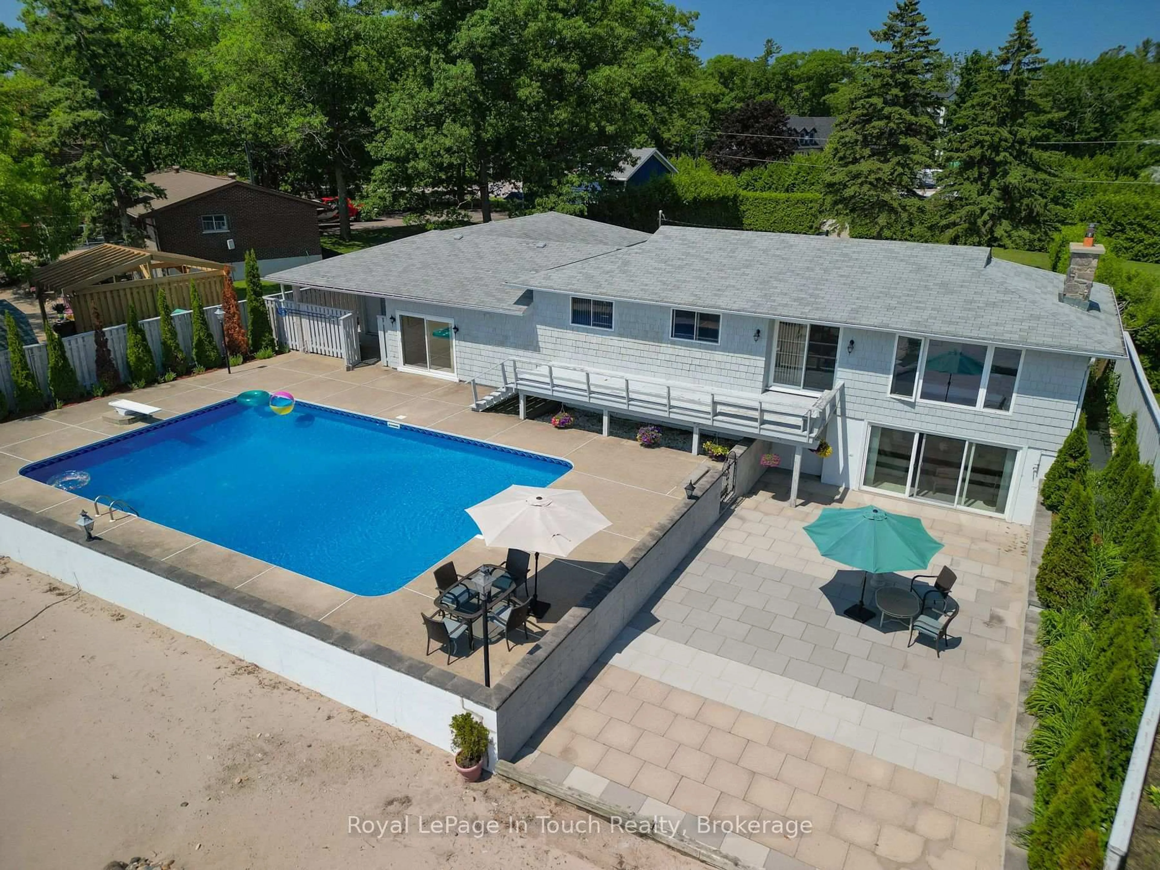 A pic from outside/outdoor area/front of a property/back of a property/a pic from drone, water/lake/river/ocean view for 1420 Tiny Beaches Rd, Tiny Ontario L9M 0H3