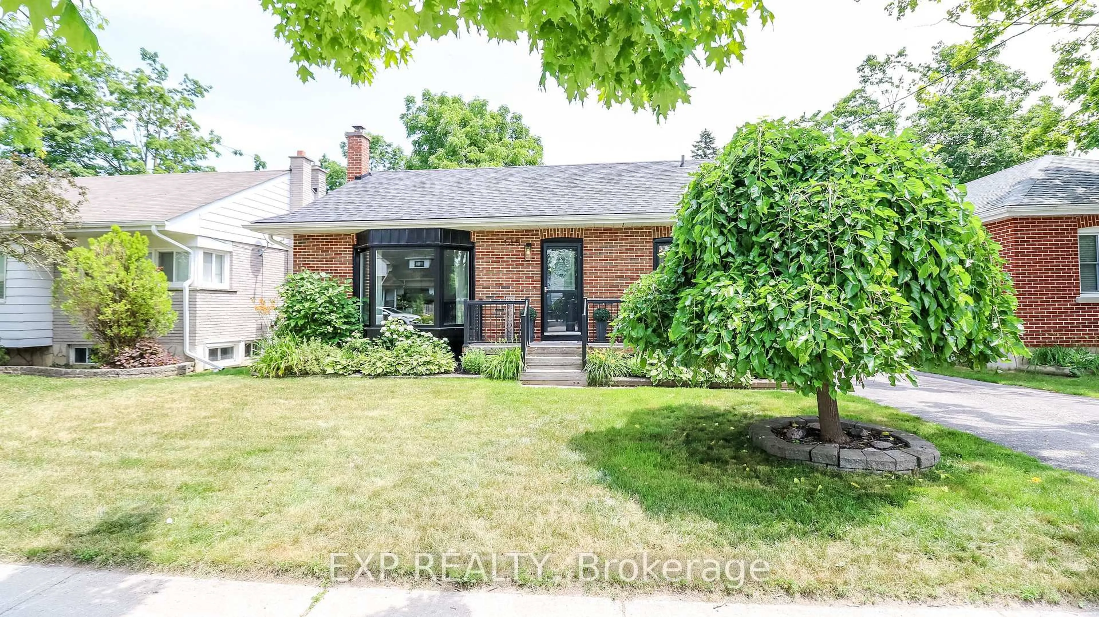 Home with brick exterior material, street for 145 Cook St, Barrie Ontario L4M 4H1