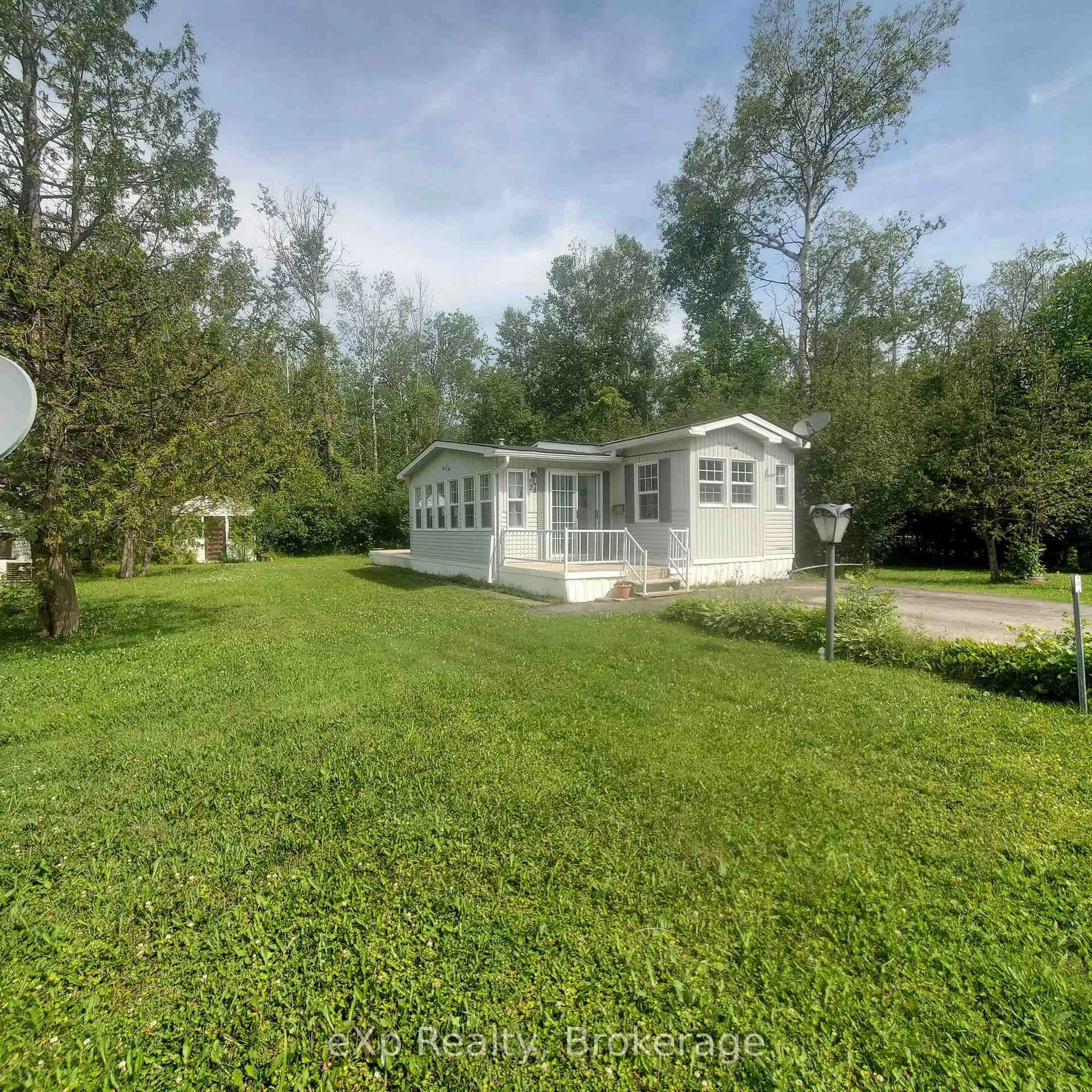 A pic from outside/outdoor area/front of a property/back of a property/a pic from drone, water/lake/river/ocean view for 24 Prince Charles Ave, Springwater Ontario L0L 1P0
