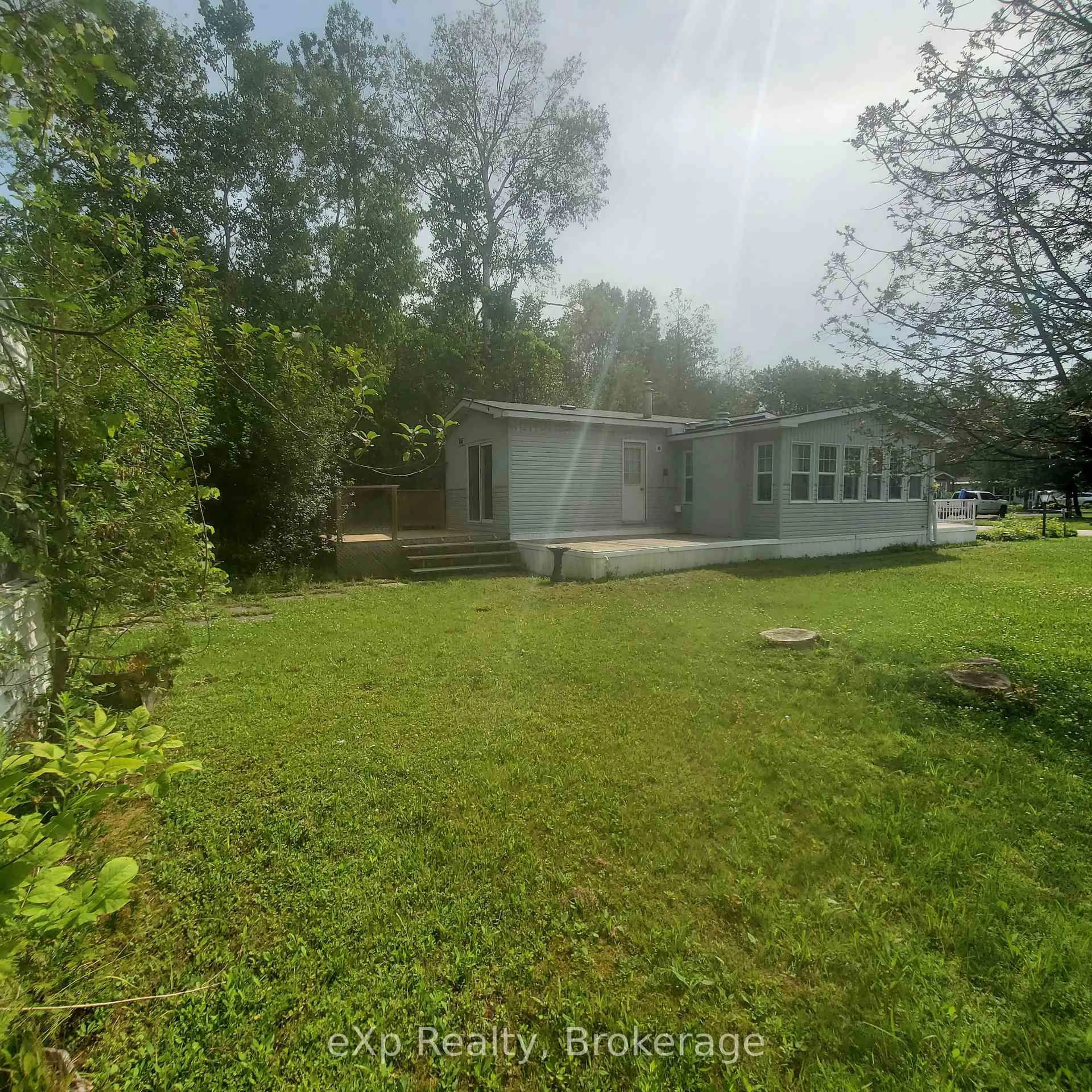 A pic from outside/outdoor area/front of a property/back of a property/a pic from drone, unknown for 24 Prince Charles Ave, Springwater Ontario L0L 1P0