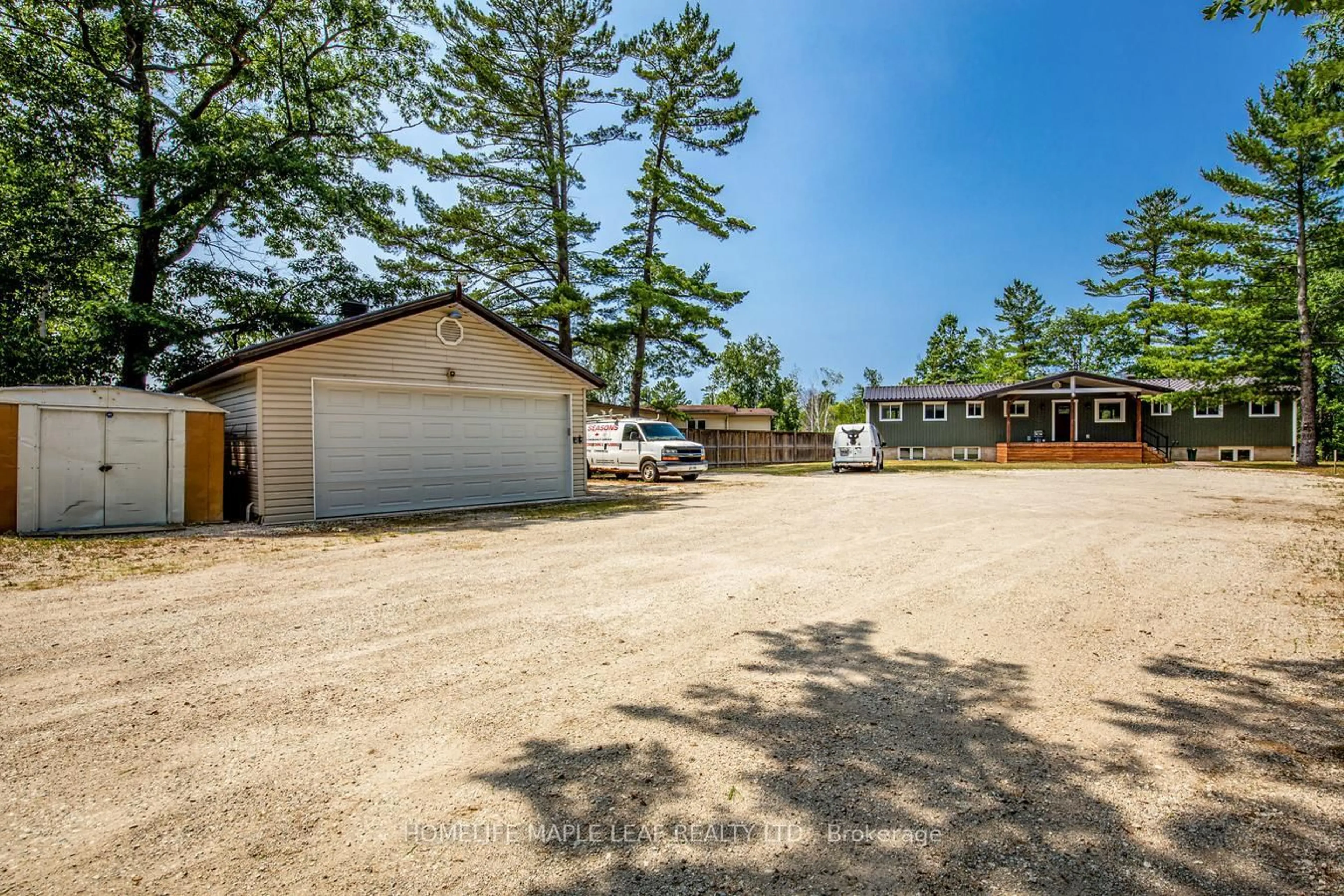 A pic from outside/outdoor area/front of a property/back of a property/a pic from drone, unknown for 1628 River Rd, Wasaga Beach Ontario L9Z 2S3