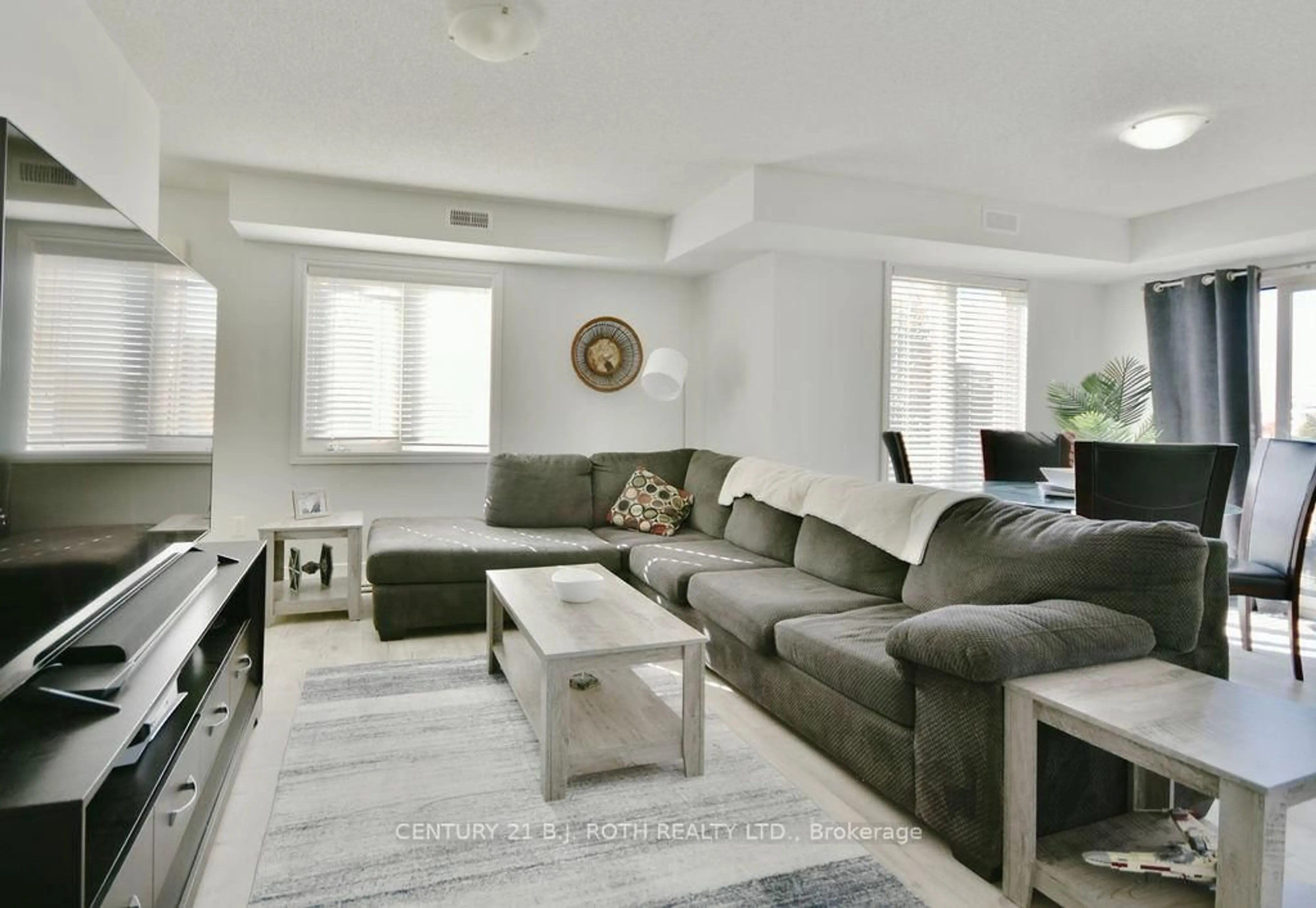 Living room with furniture, unknown for 25 Madelaine Dr #5, Barrie Ontario L9J 0G8