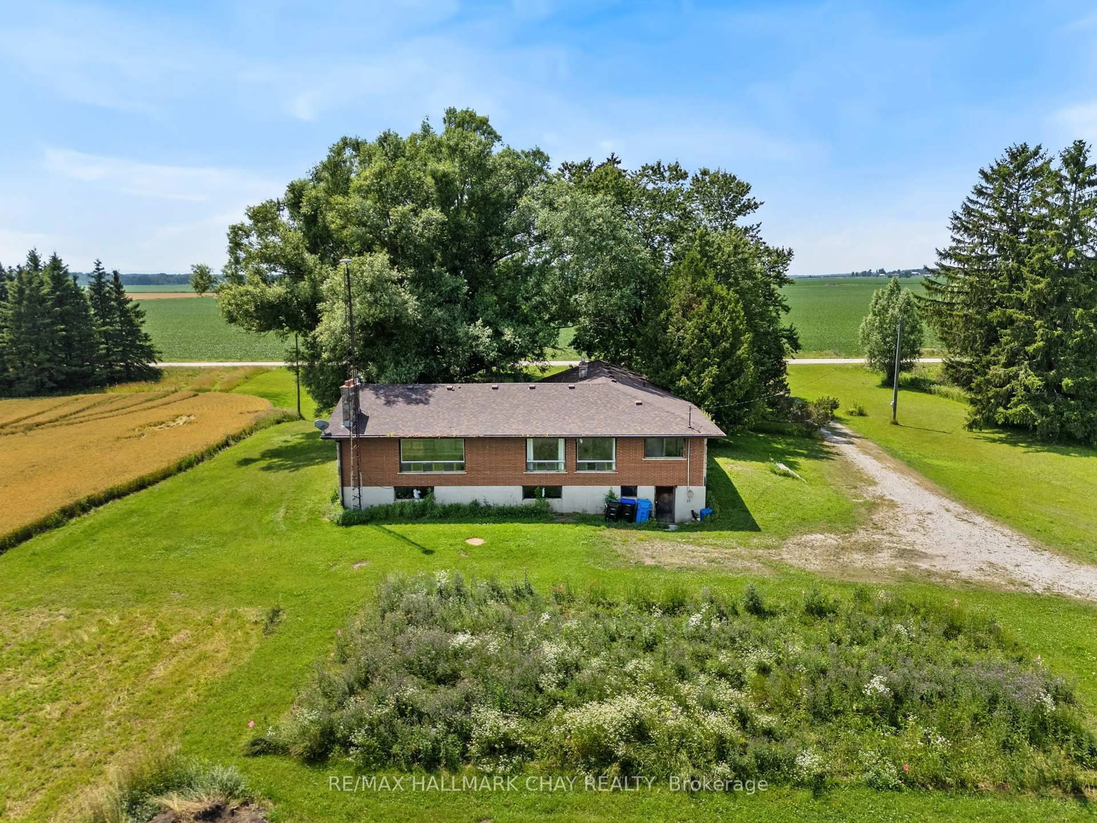 A pic from outside/outdoor area/front of a property/back of a property/a pic from drone, water/lake/river/ocean view for 2247 15/16 Sdrd S Sunn, Clearview Ontario L0M 1N0