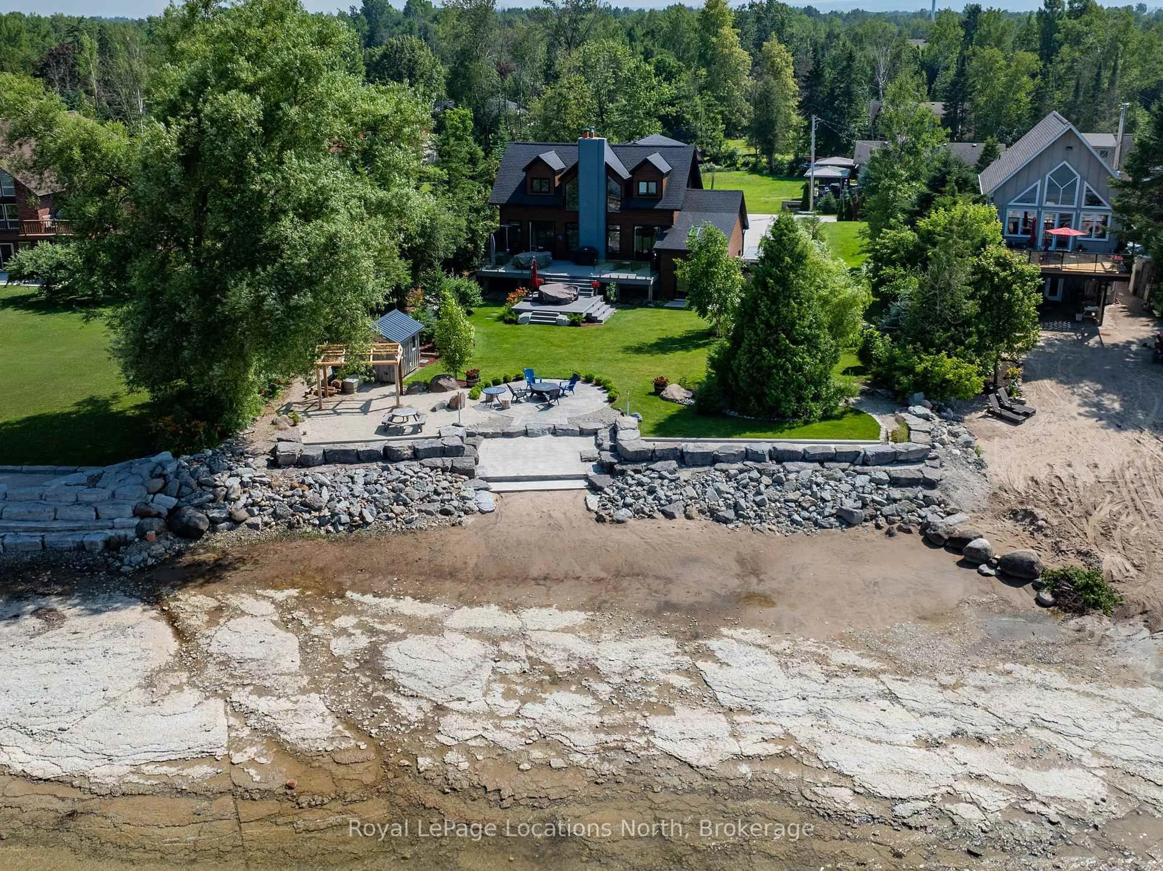 A pic from outside/outdoor area/front of a property/back of a property/a pic from drone, water/lake/river/ocean view for 33 D Lane, Collingwood Ontario L9Y 0X2