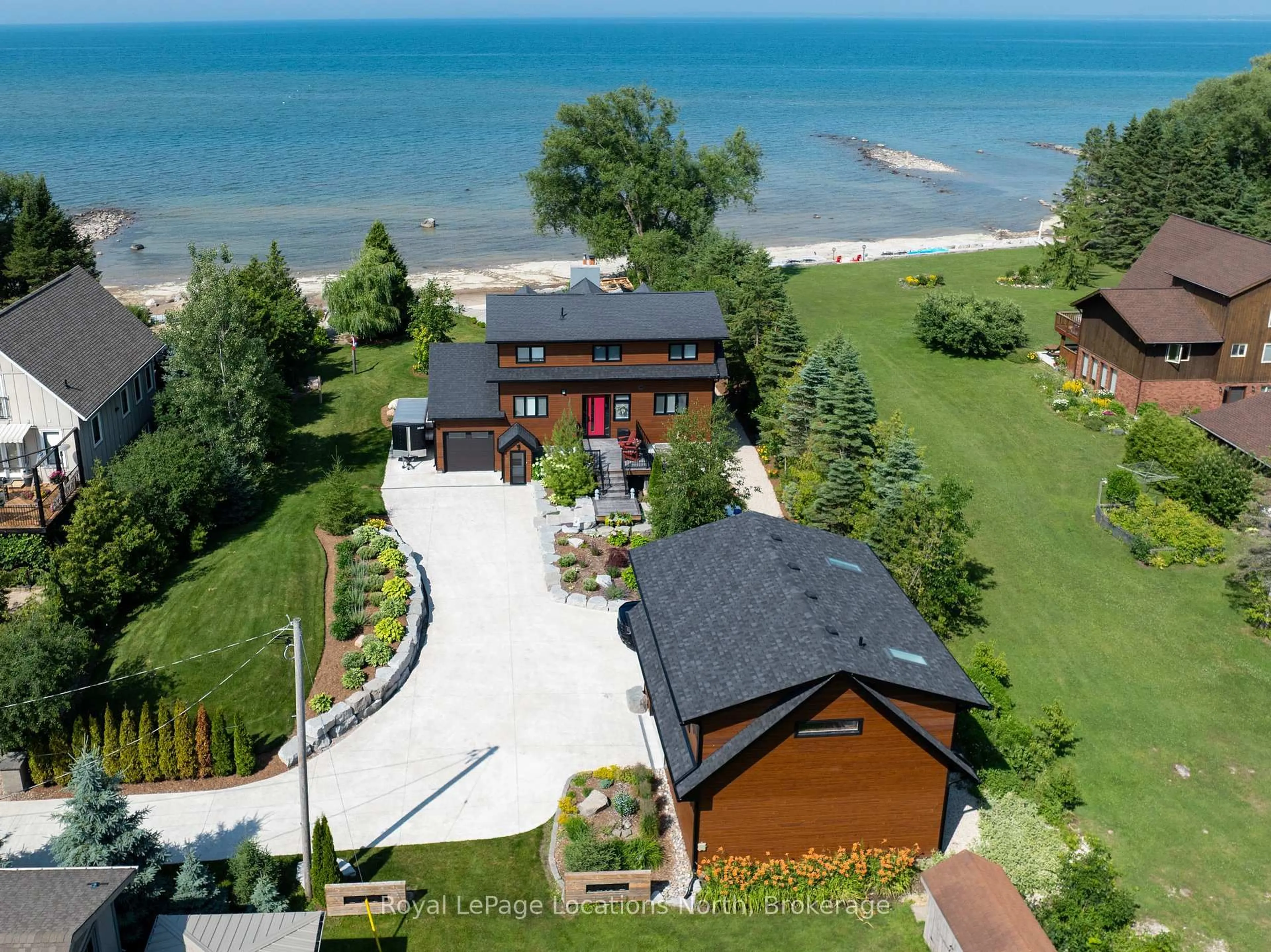 A pic from outside/outdoor area/front of a property/back of a property/a pic from drone, water/lake/river/ocean view for 33 D Lane, Collingwood Ontario L9Y 0X2