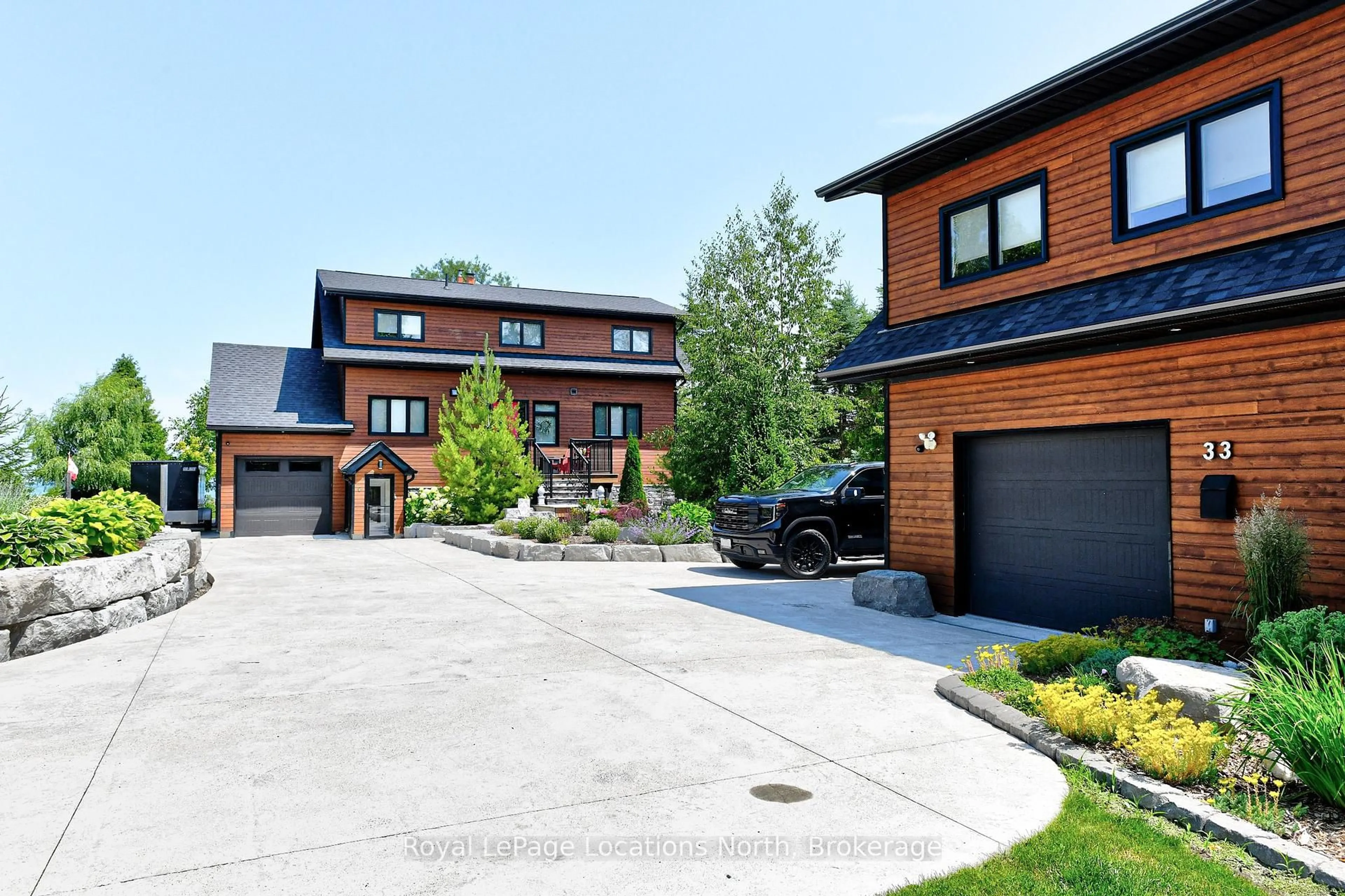 Home with brick exterior material, street for 33 D Lane, Collingwood Ontario L9Y 0X2