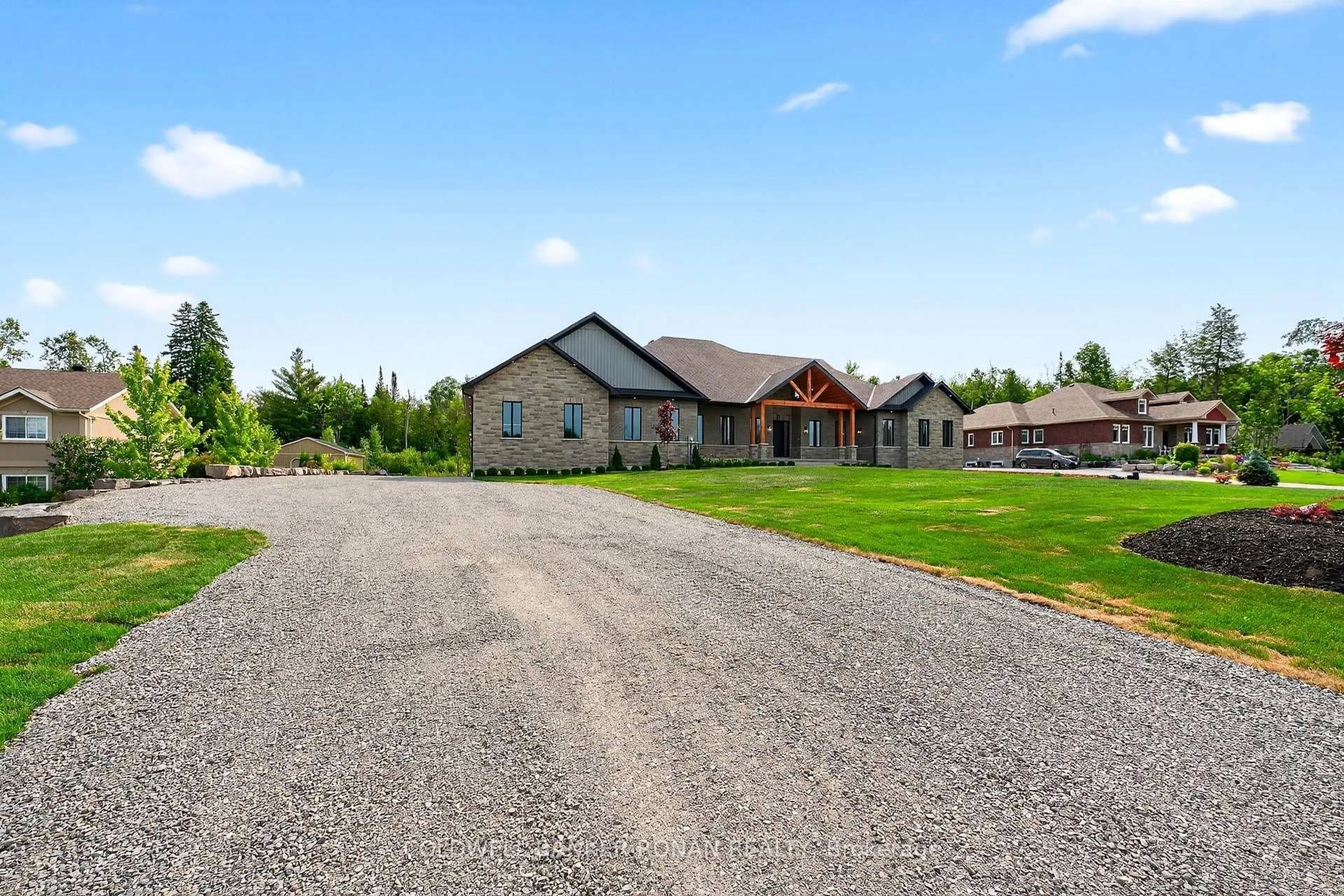 A pic from outside/outdoor area/front of a property/back of a property/a pic from drone, unknown for 60 Marni Lane, Springwater Ontario L0L 2K0