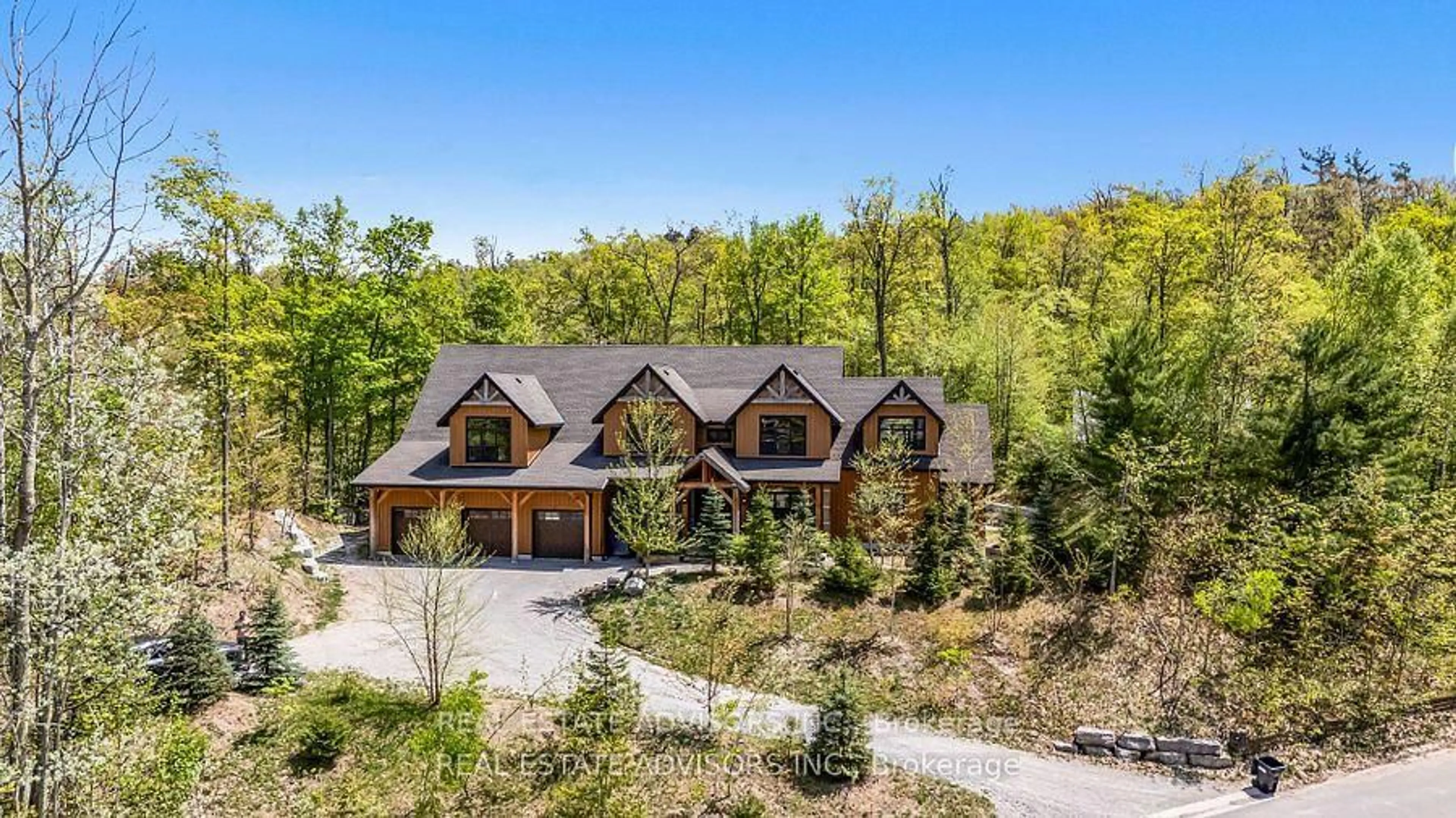 A pic from outside/outdoor area/front of a property/back of a property/a pic from drone, mountain view for 54 Pine Ridge Tr, Oro-Medonte Ontario L4M 4Y8