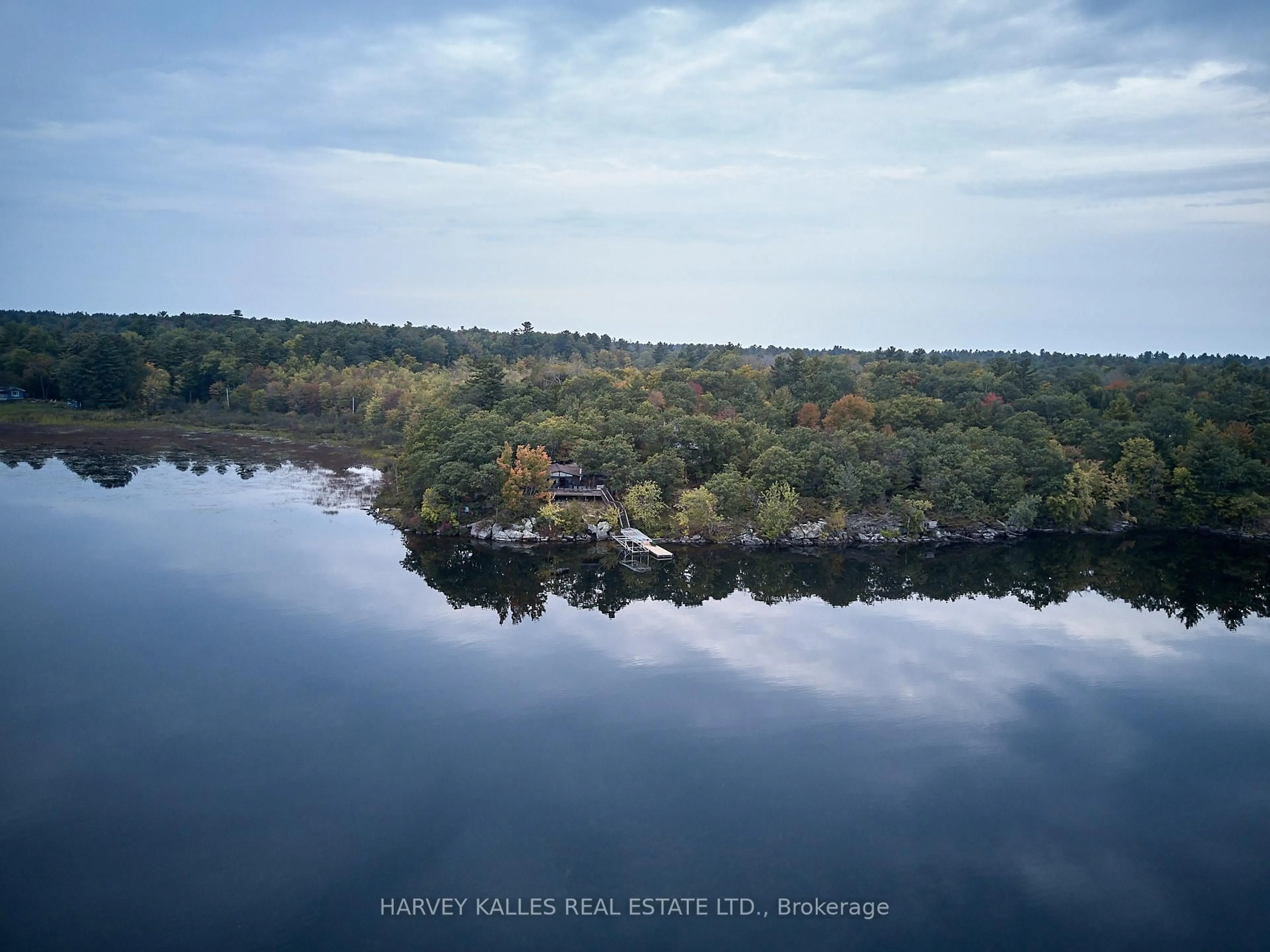 A pic from outside/outdoor area/front of a property/back of a property/a pic from drone, water/lake/river/ocean view for 1168 Apter Lane, Severn Ontario P0E 1N0