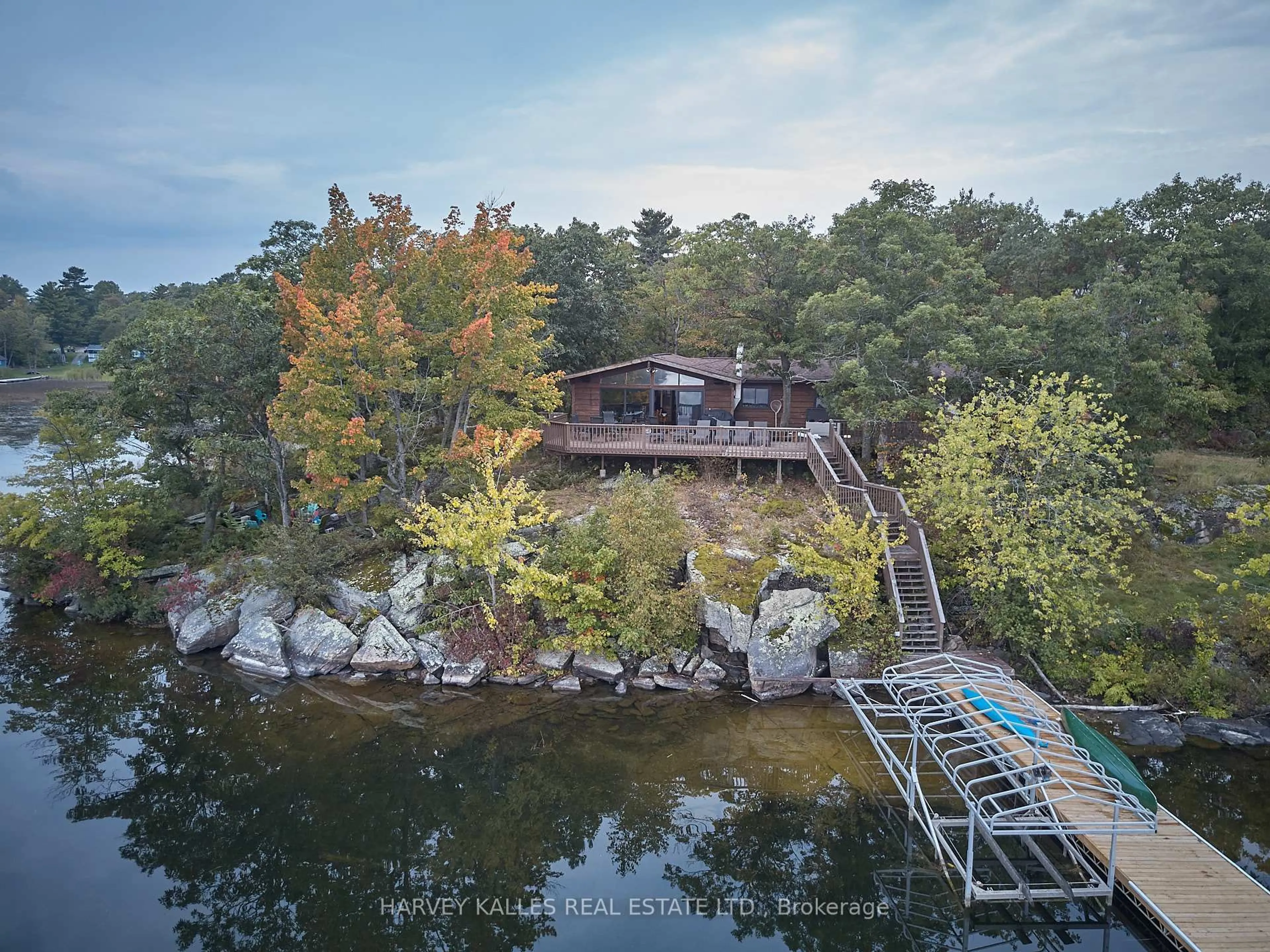A pic from outside/outdoor area/front of a property/back of a property/a pic from drone, water/lake/river/ocean view for 1168 Apter Lane, Severn Ontario P0E 1N0